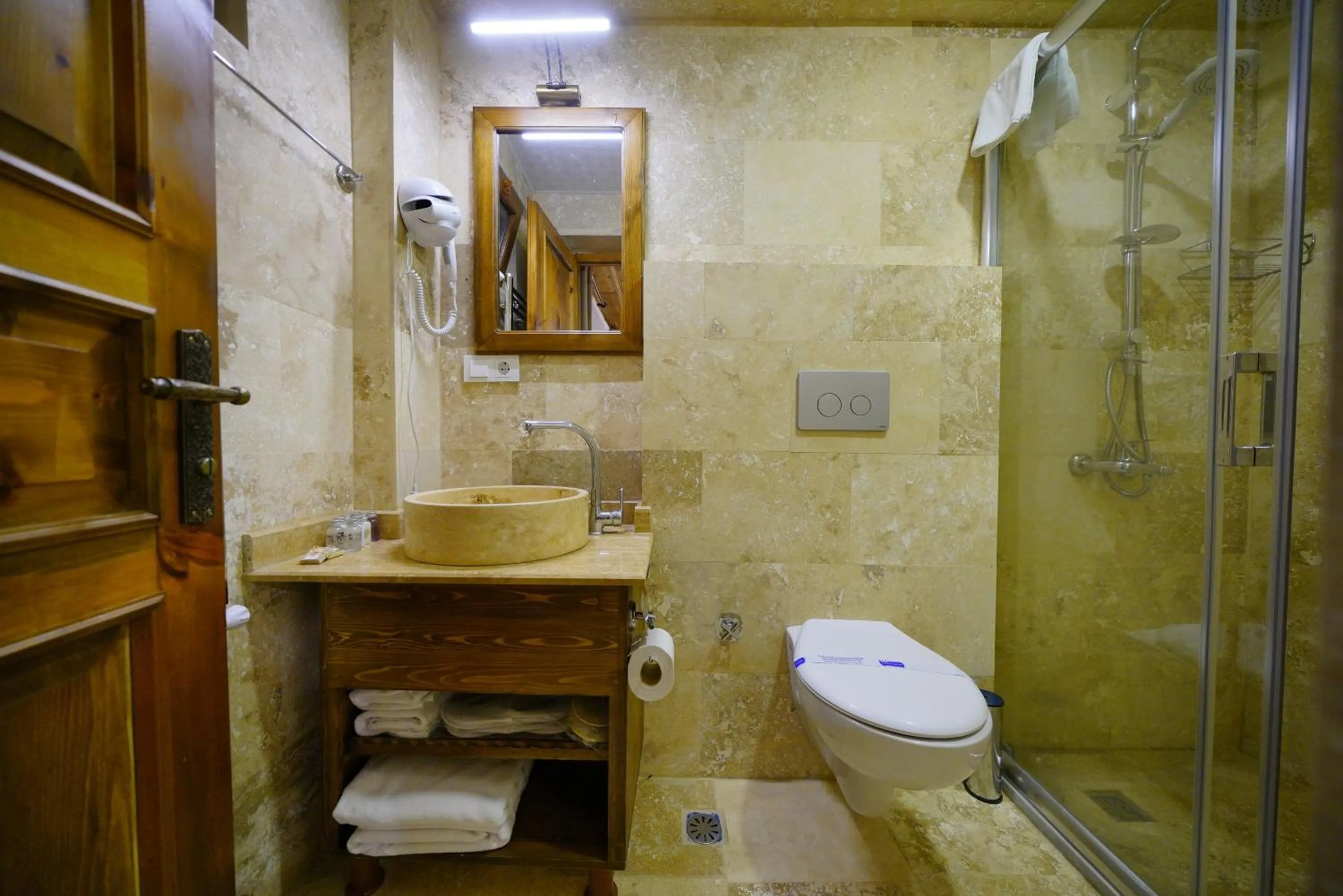 Toilet in Enjoy Stone Hotel