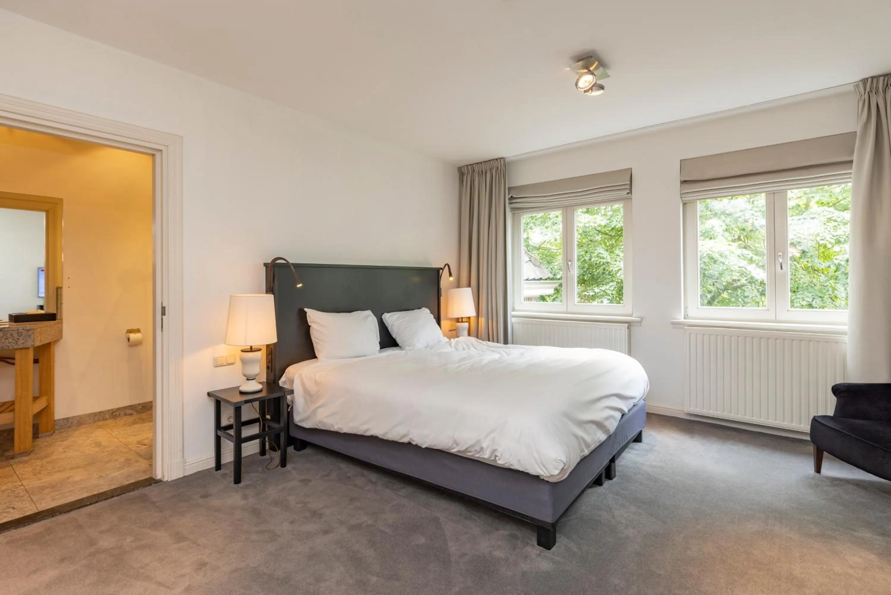 Bed in Fletcher Hotel Château De Raay