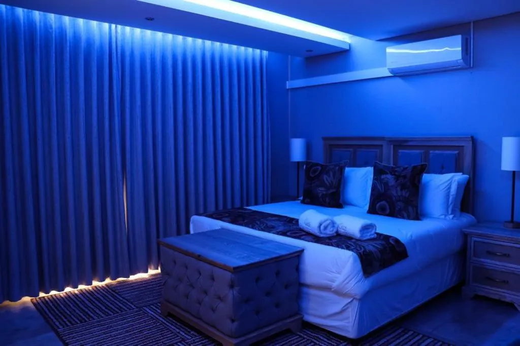 Bed in EDEN BOUTIQUE HOTEL