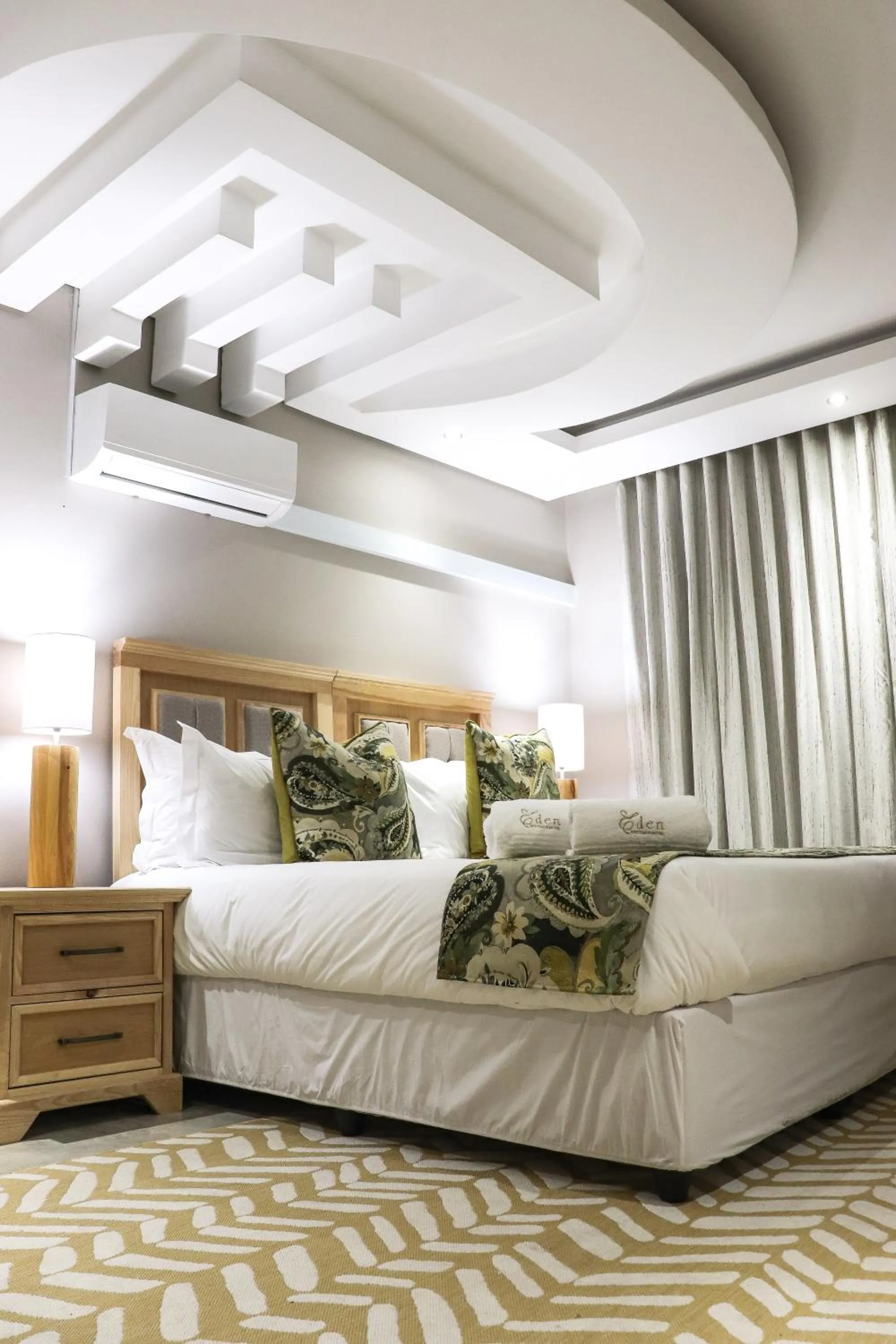 Bed in EDEN BOUTIQUE HOTEL