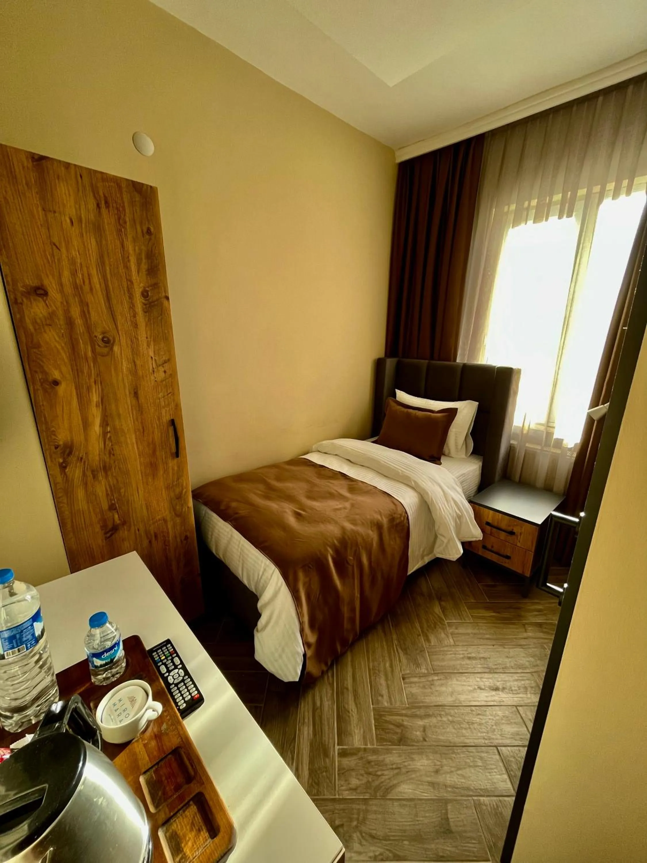 Bed in Miro Mara Boutique Hotel & Lounge Bar