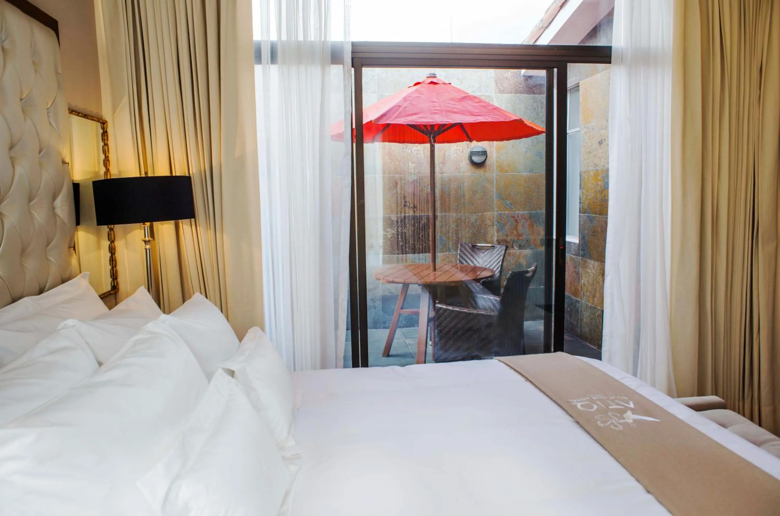 Balcony/Terrace, Bed in Atiq Boutique Hotel