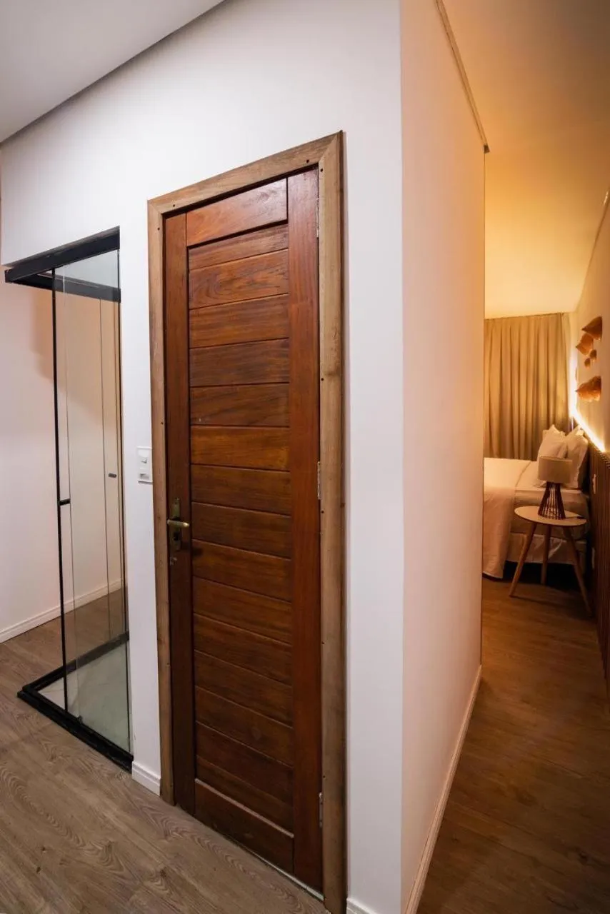 Photo of the whole room, Bed in POUSADA AMAR NORONHA