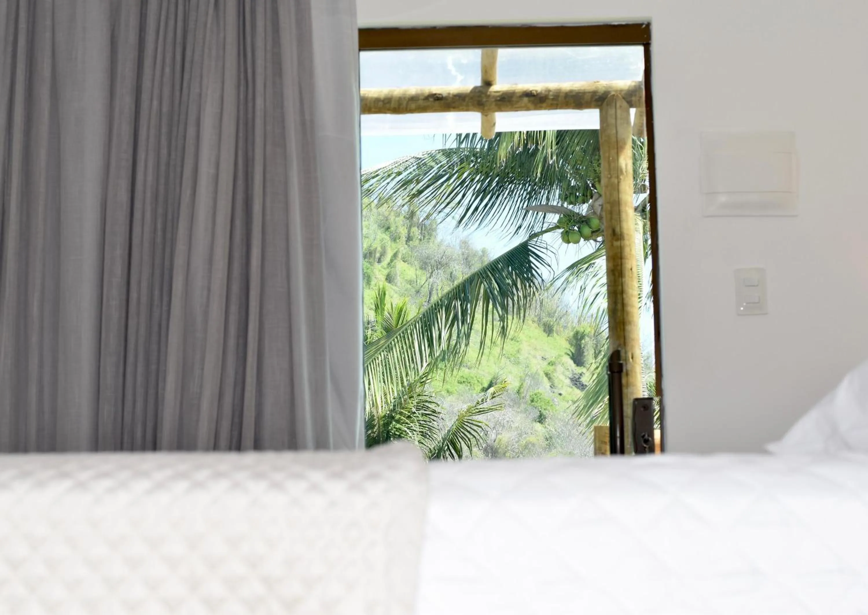 Bed in POUSADA AMAR NORONHA