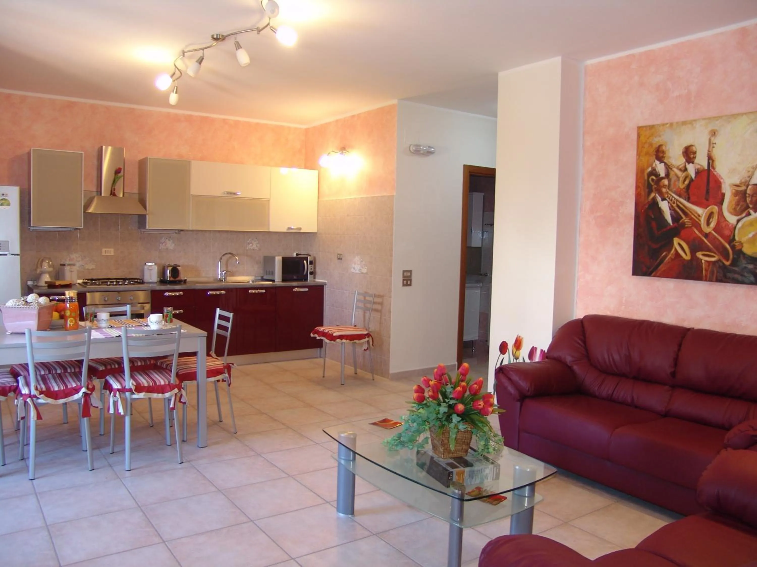 Communal lounge/ TV room in B&B il Tulipano