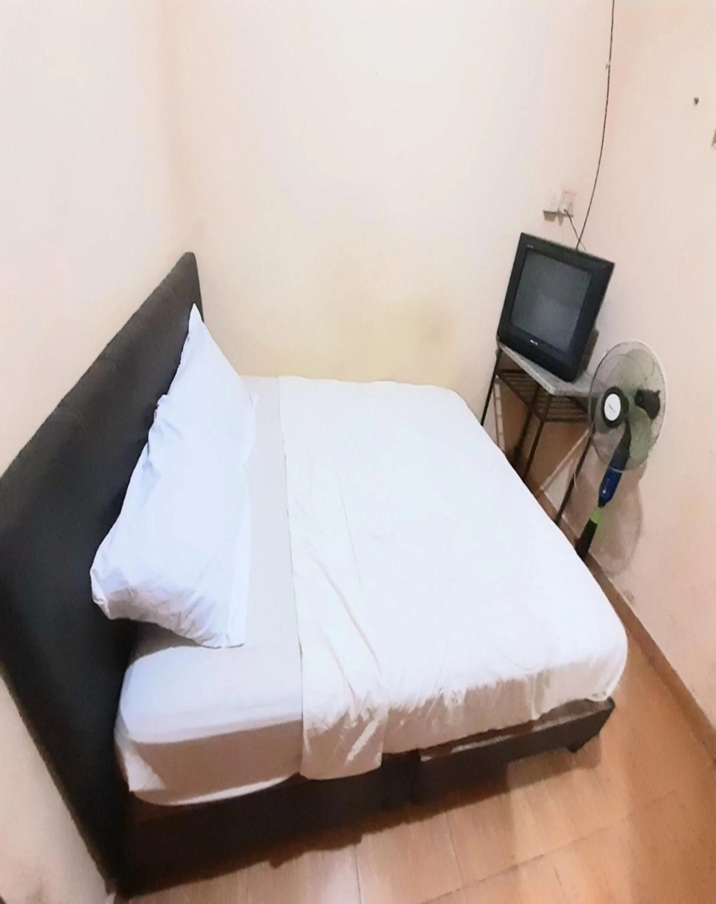 Photo of the whole room, Bed in Hotel O Pondok Anie SyariahNearJembatan Siak