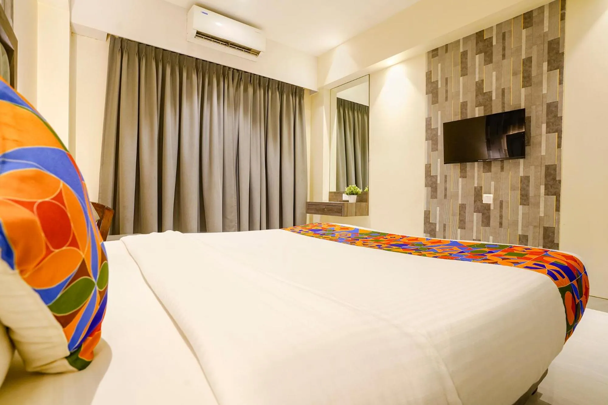 Bed in FabHotel Prime Shubham Comforts