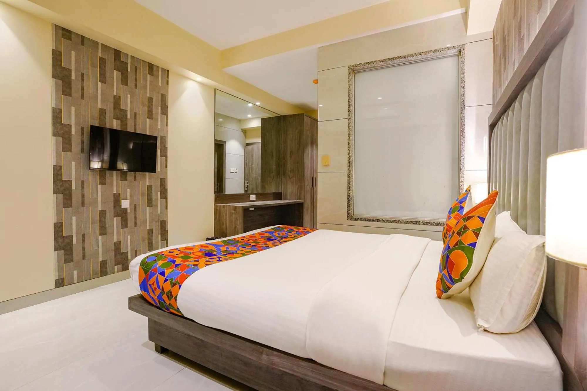 Bed in FabHotel Prime Shubham Comforts