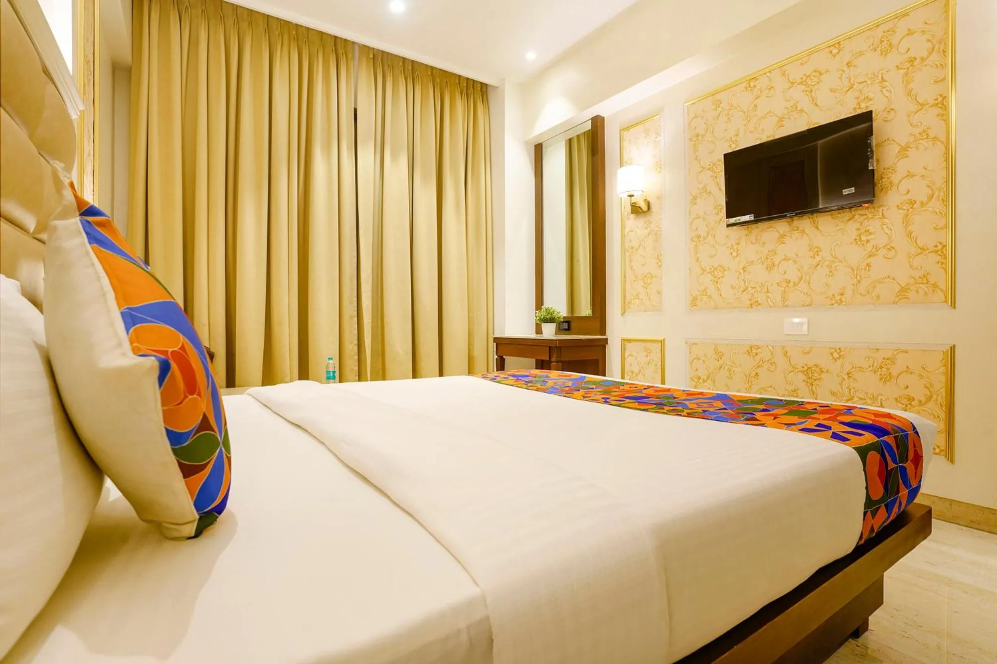 Bed in FabHotel Prime Shubham Comforts