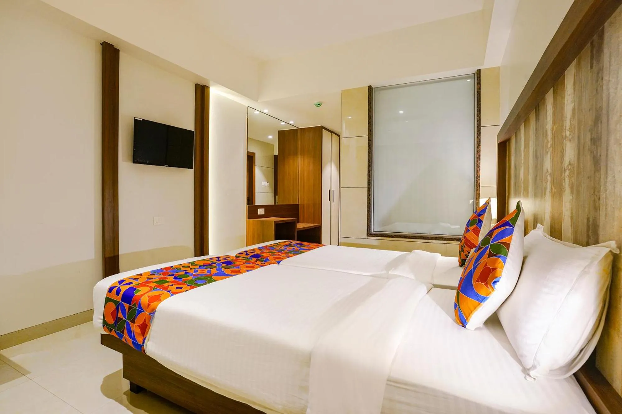 Bed in FabHotel Prime Shubham Comforts