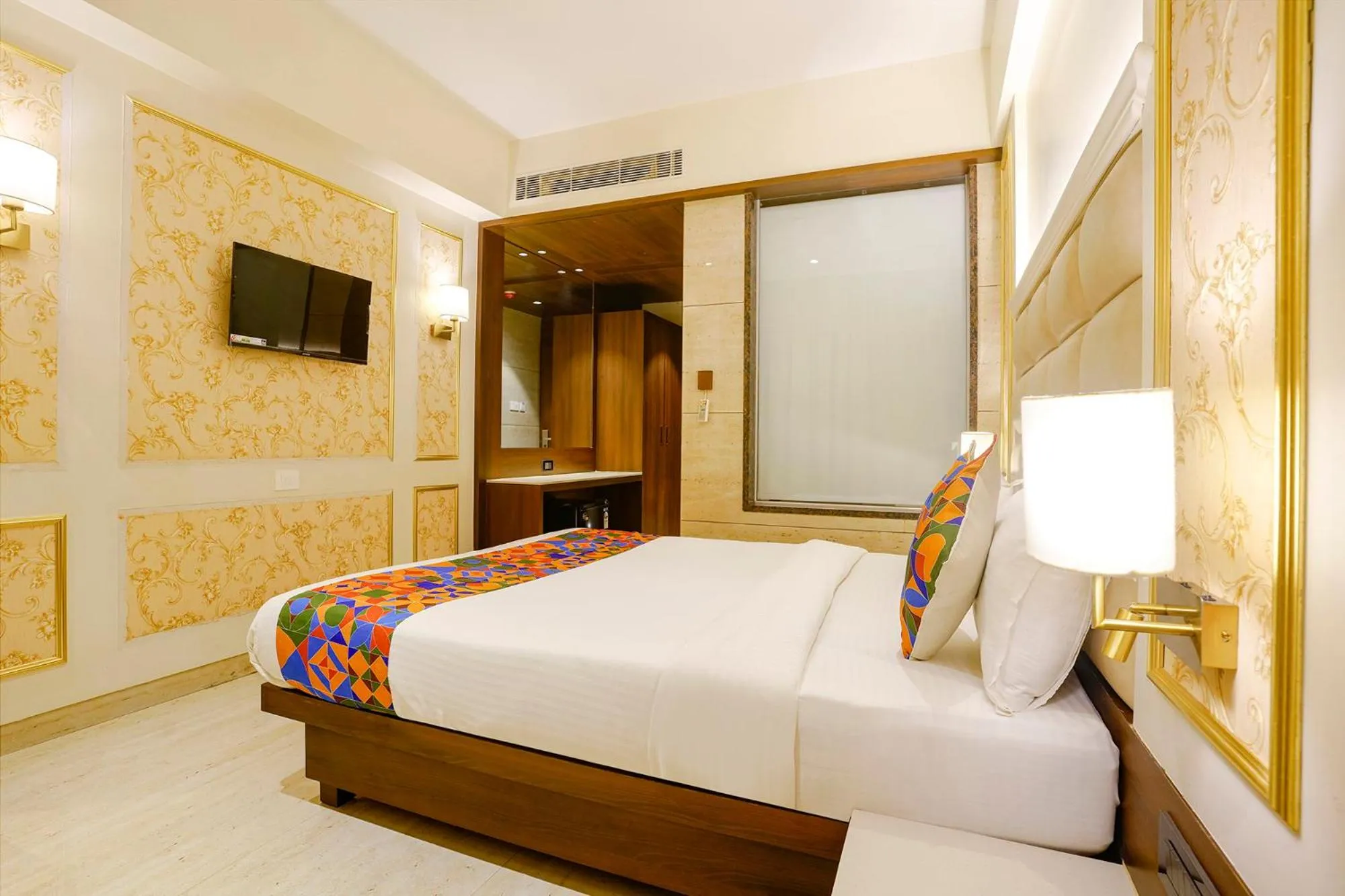 Bed in FabHotel Prime Shubham Comforts