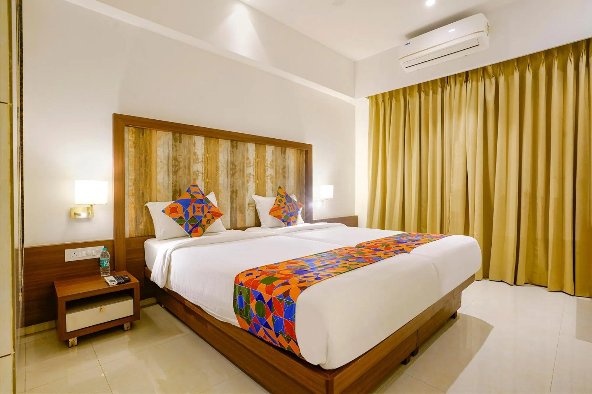 Bed in FabHotel Prime Shubham Comforts