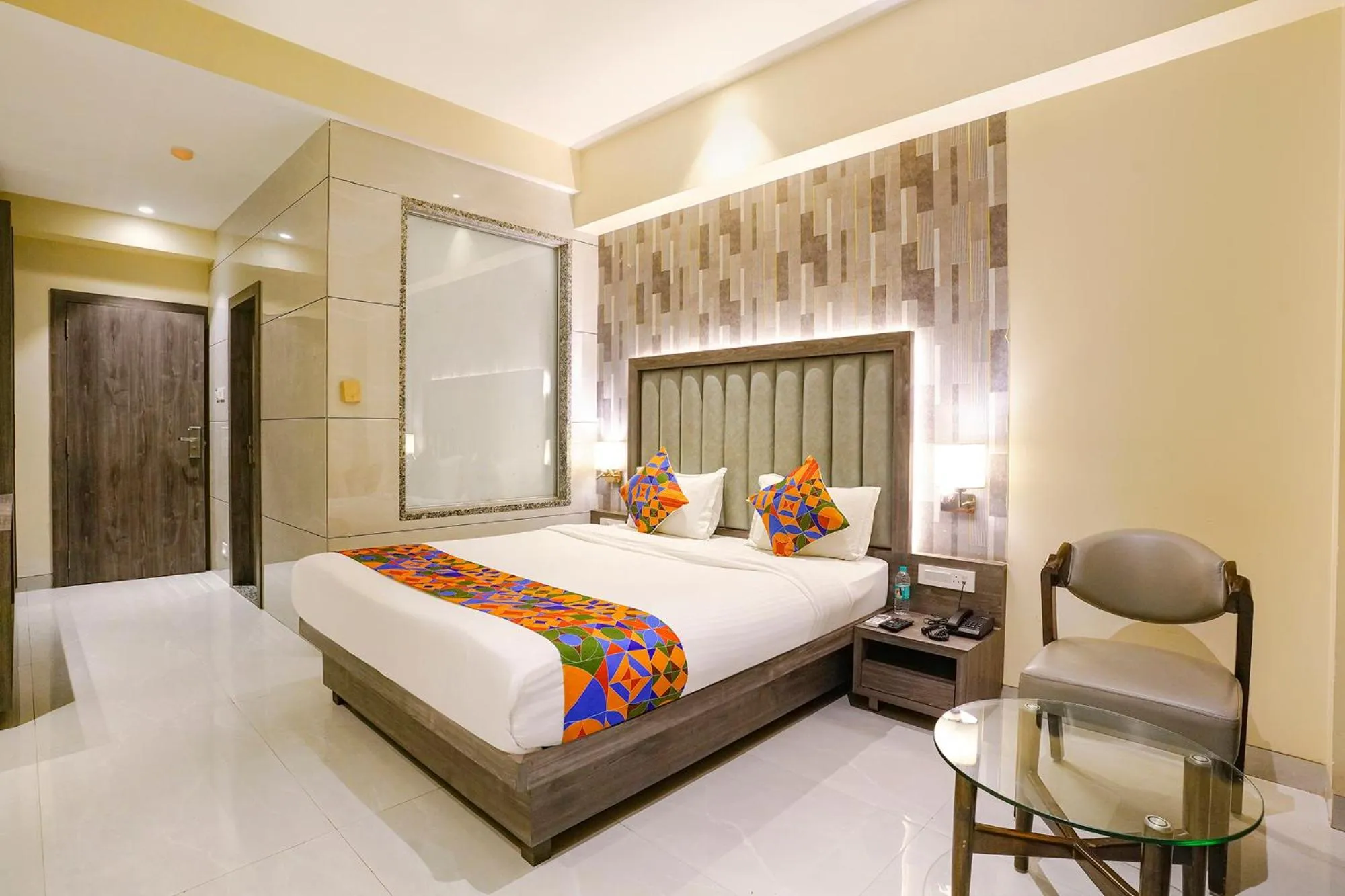 Bed in FabHotel Prime Shubham Comforts