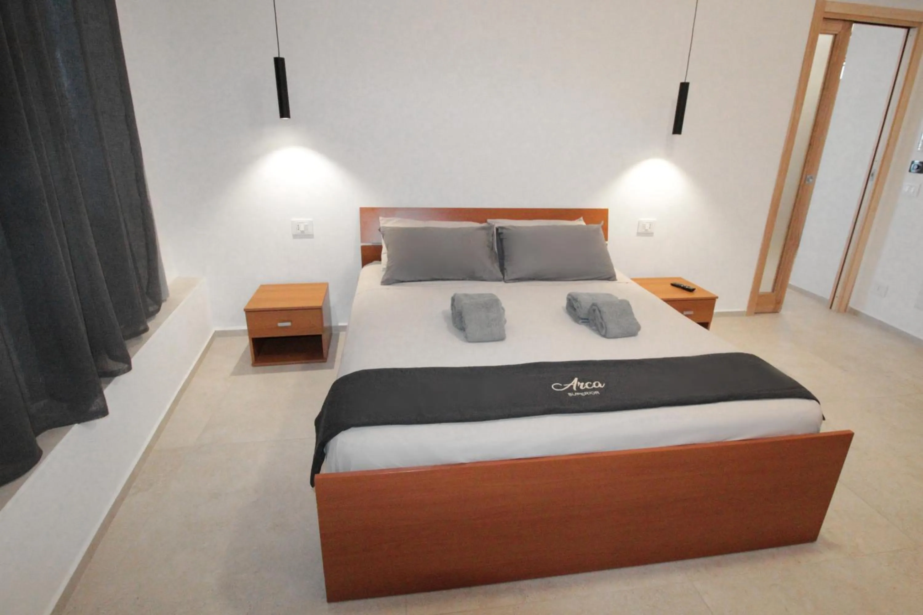 Bed in L' Arca Residence