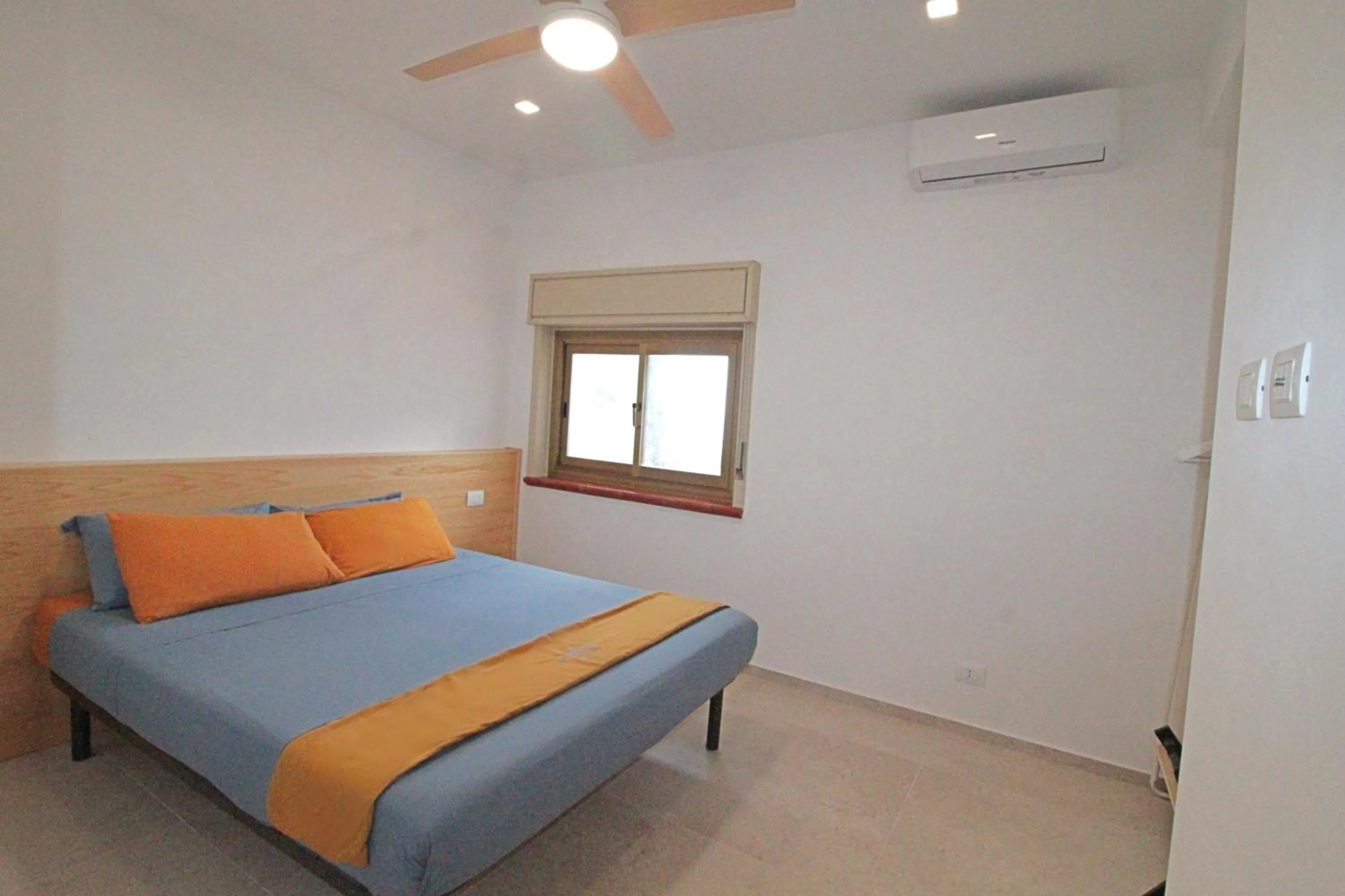 Bed in L' Arca Residence