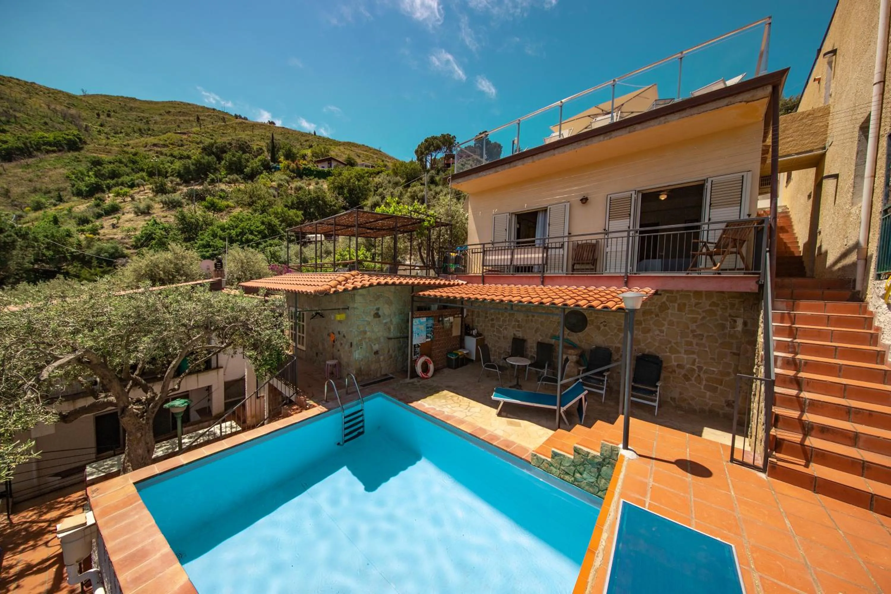 Pool view in L' Arca Residence