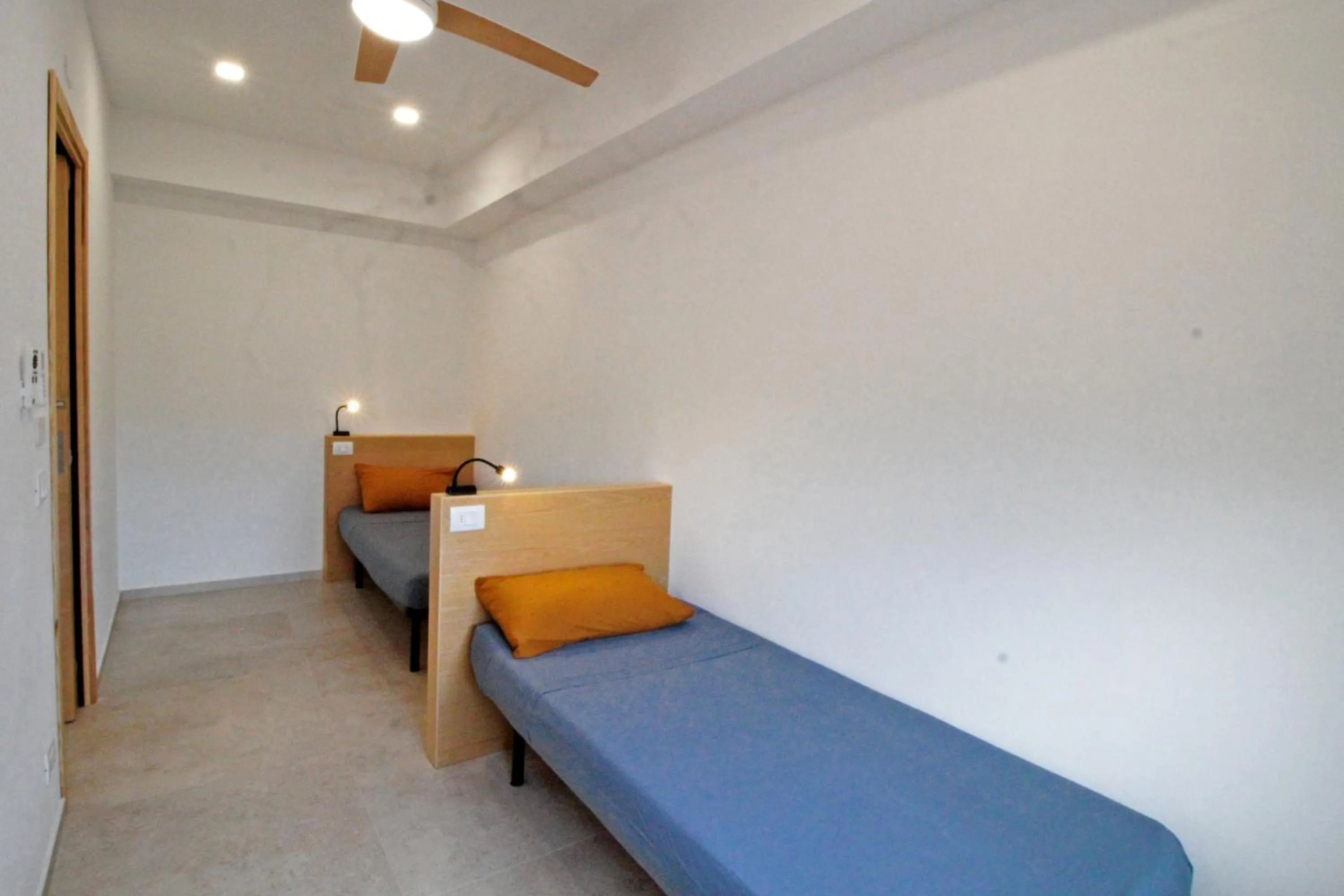 Bed in L' Arca Residence