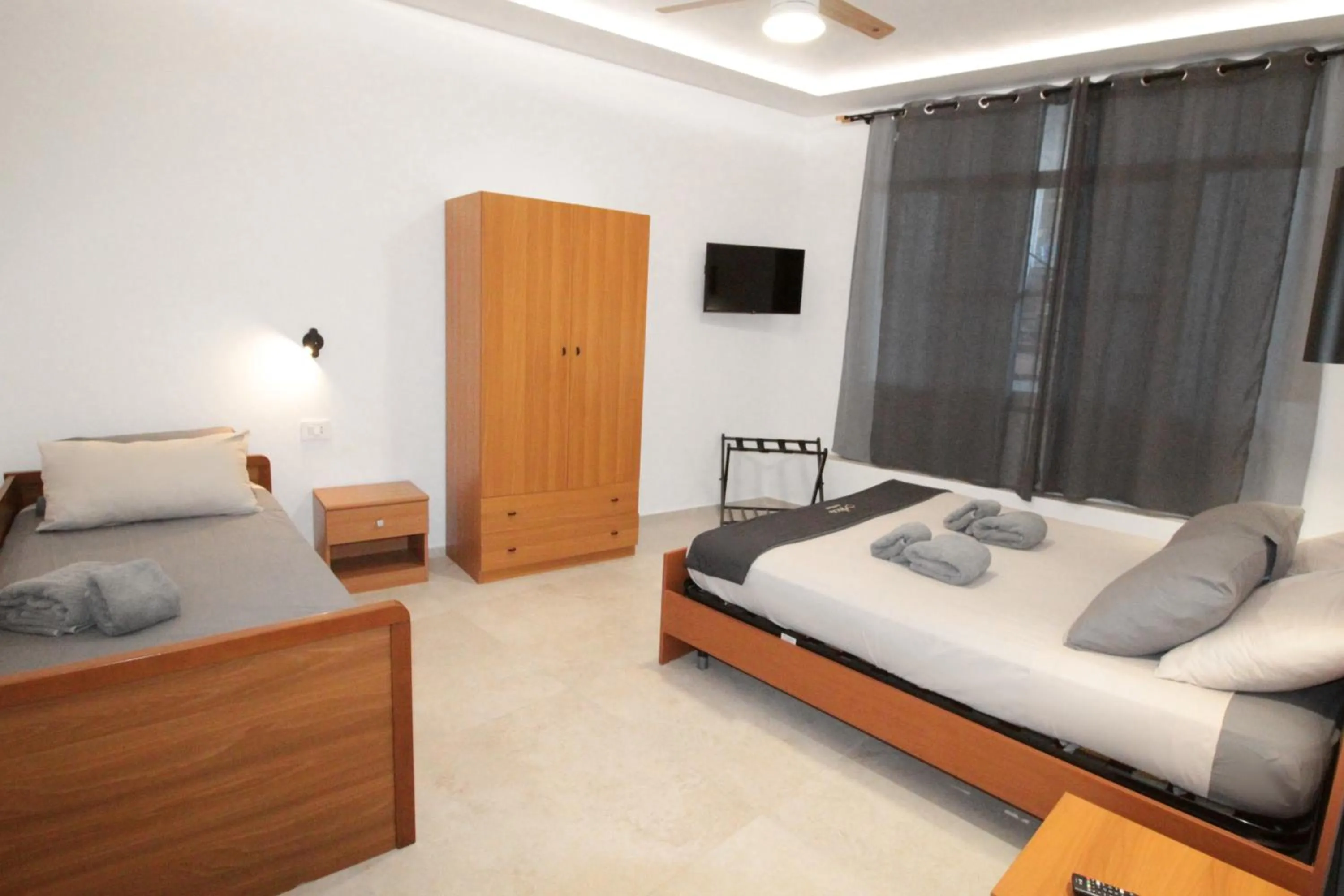 Bed in L' Arca Residence