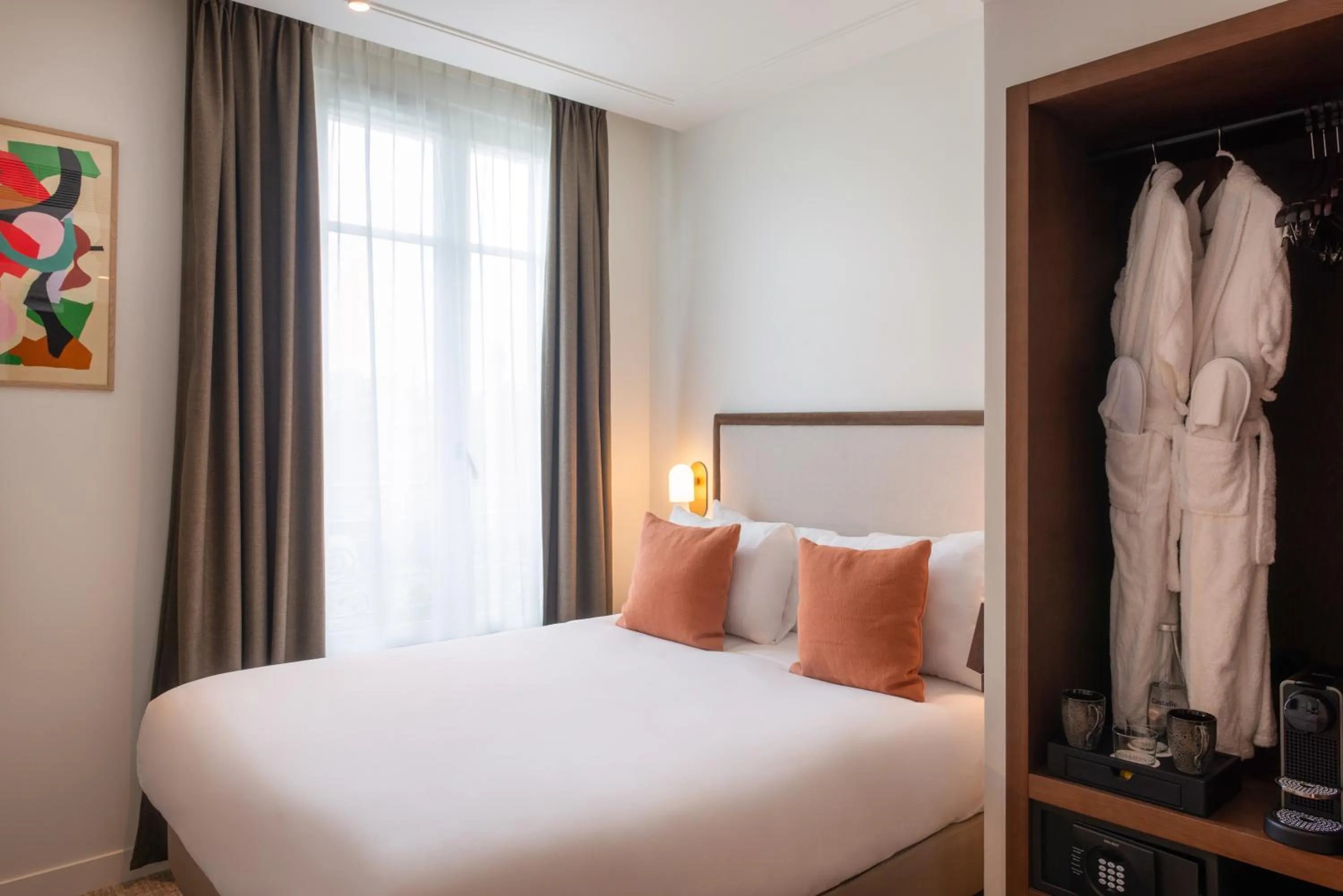 Bed in Le Lampika Hôtel