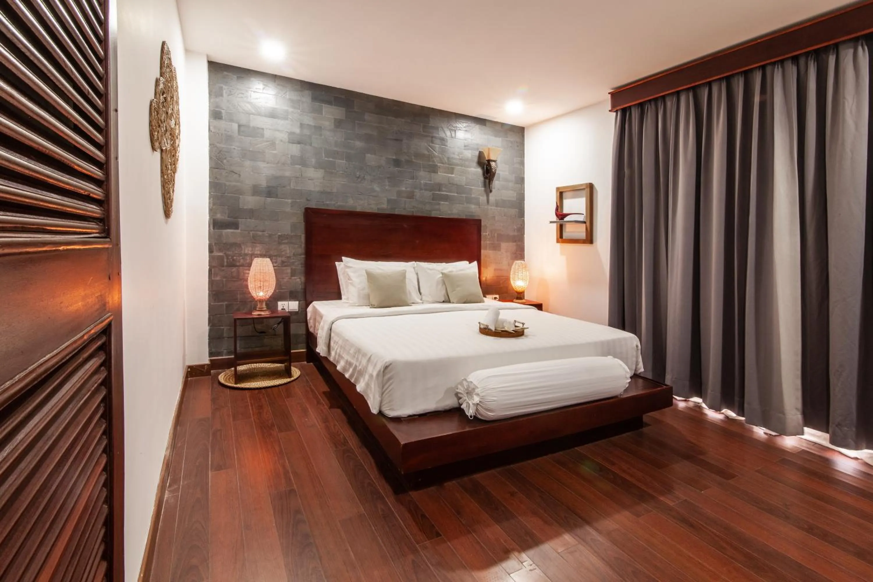 Bed in Angkor Eden Boutique Hotel