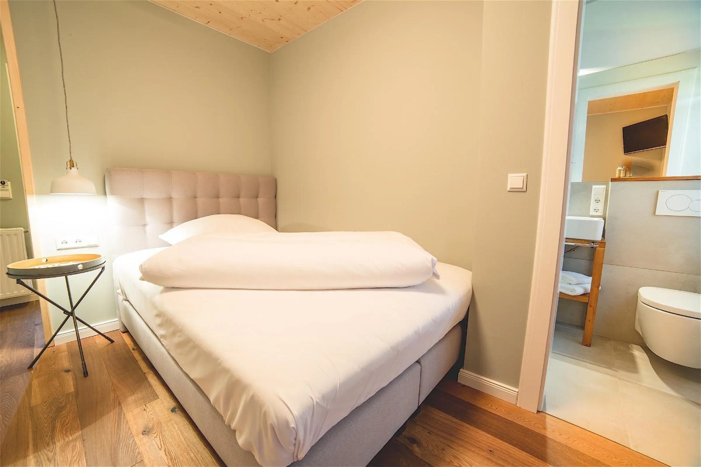 Photo of the whole room, Bed in Allgäuer Genusshotel und Historischer Dorfgasthof Hirsch