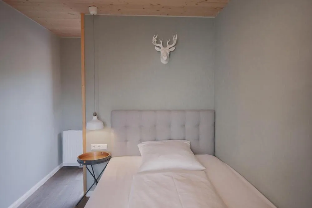 Photo of the whole room, Bed in Allgäuer Genusshotel und Historischer Dorfgasthof Hirsch