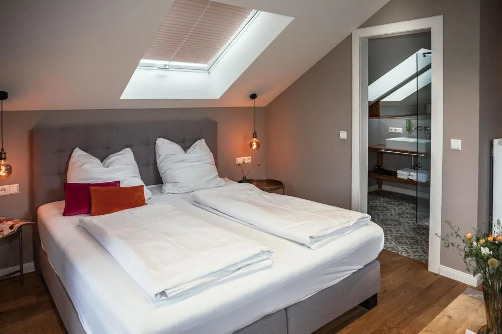 Photo of the whole room, Bed in Allgäuer Genusshotel und Historischer Dorfgasthof Hirsch