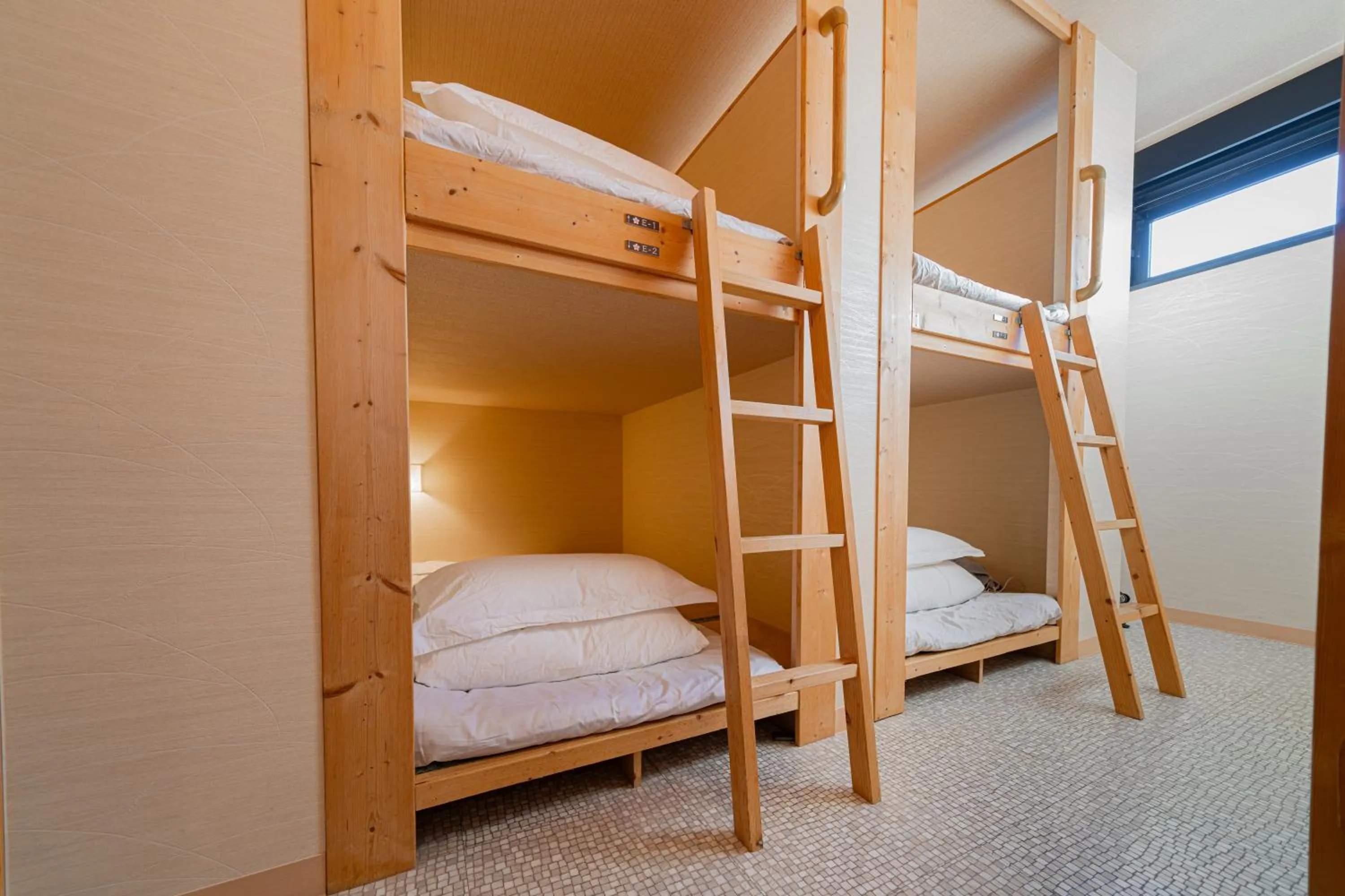 Bed in E JOY INN-East Nipoori Branch