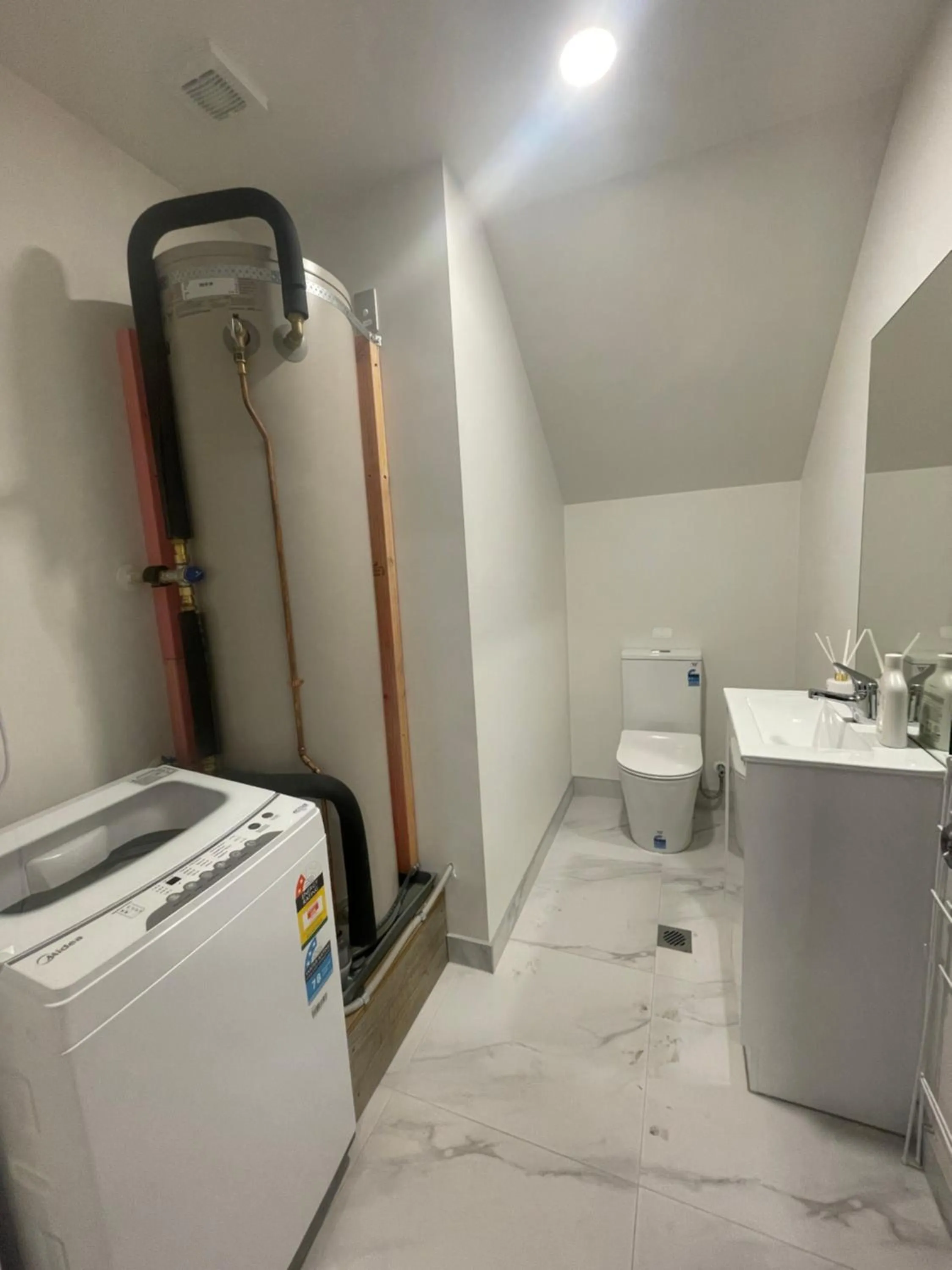 Toilet in Modern Home by the Reserve