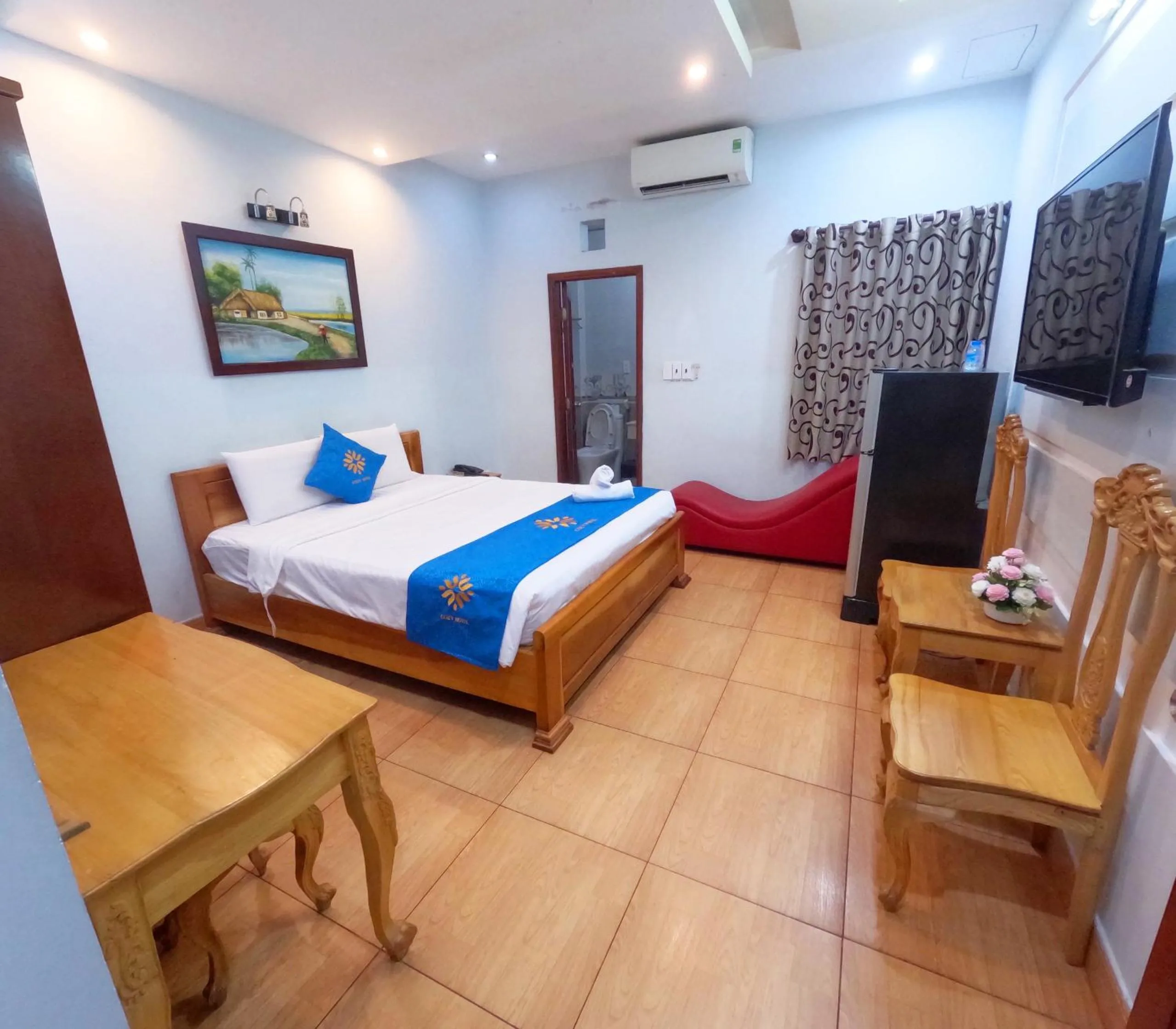 Bed in COZY Hotel HCM