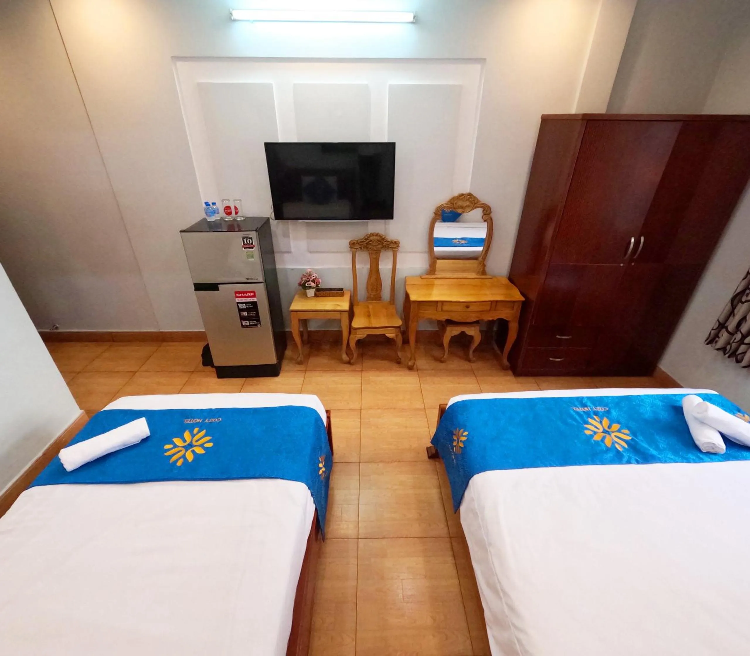 Bed in COZY Hotel HCM