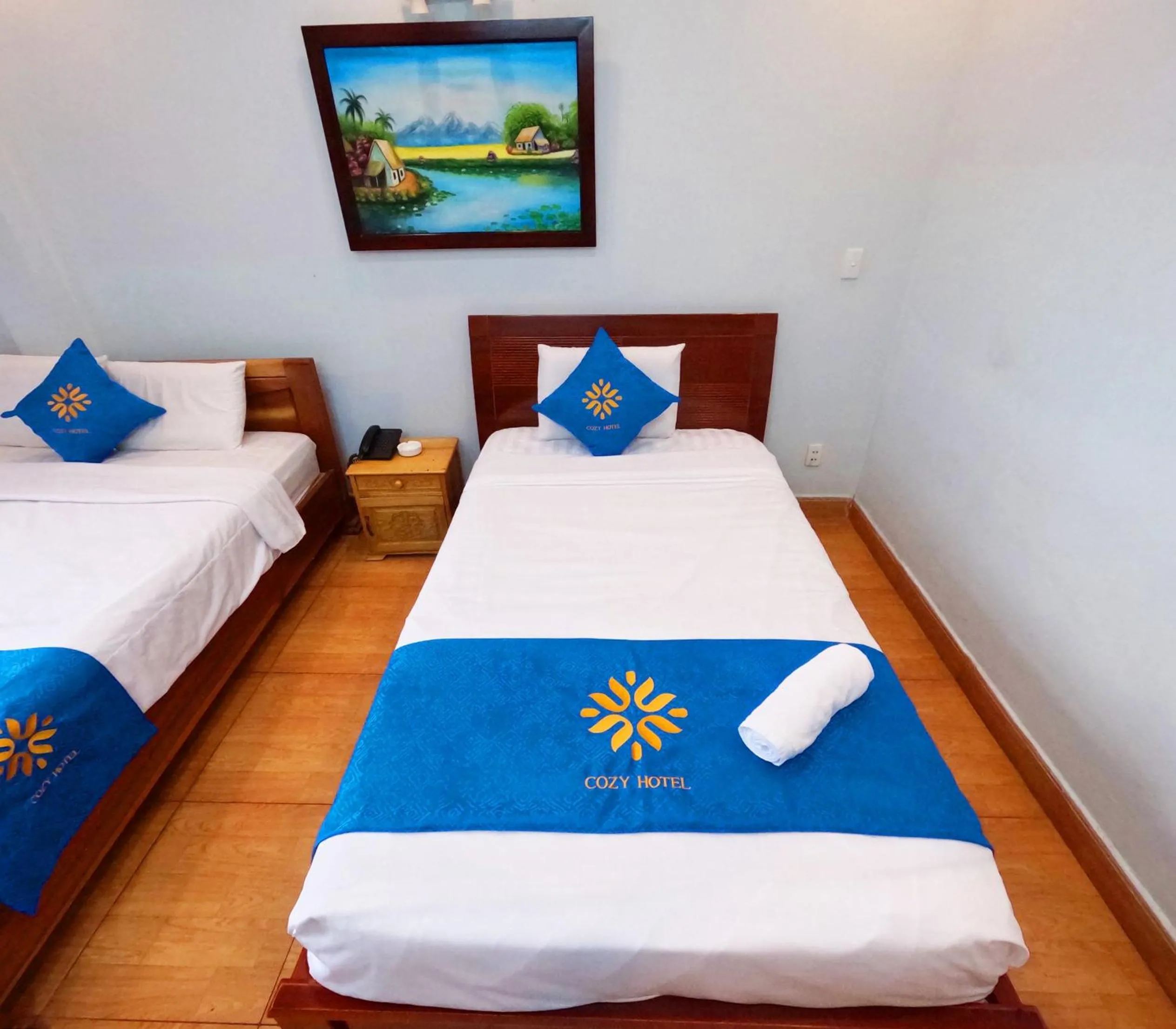 Bed in COZY Hotel HCM