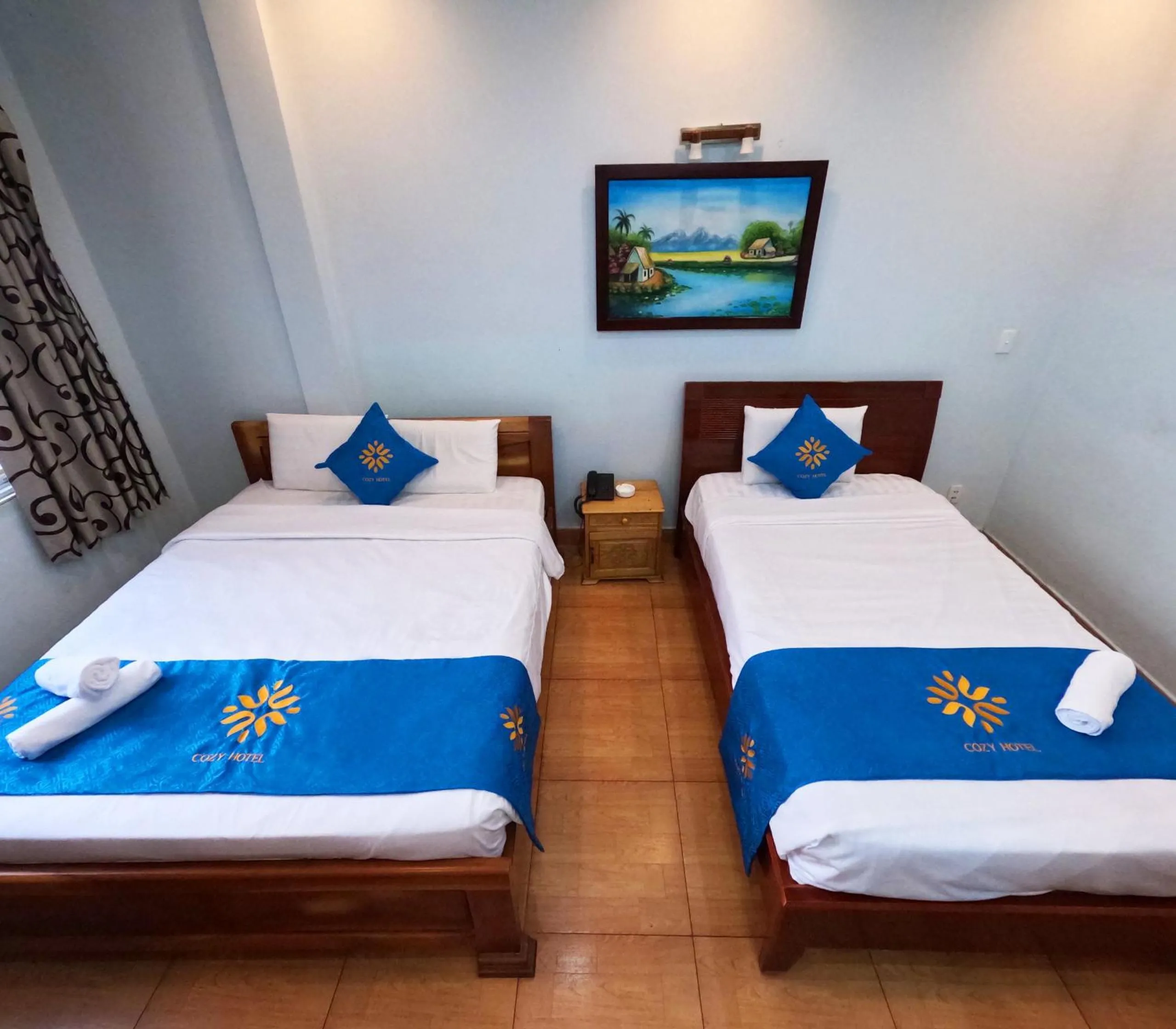 Bed in COZY Hotel HCM