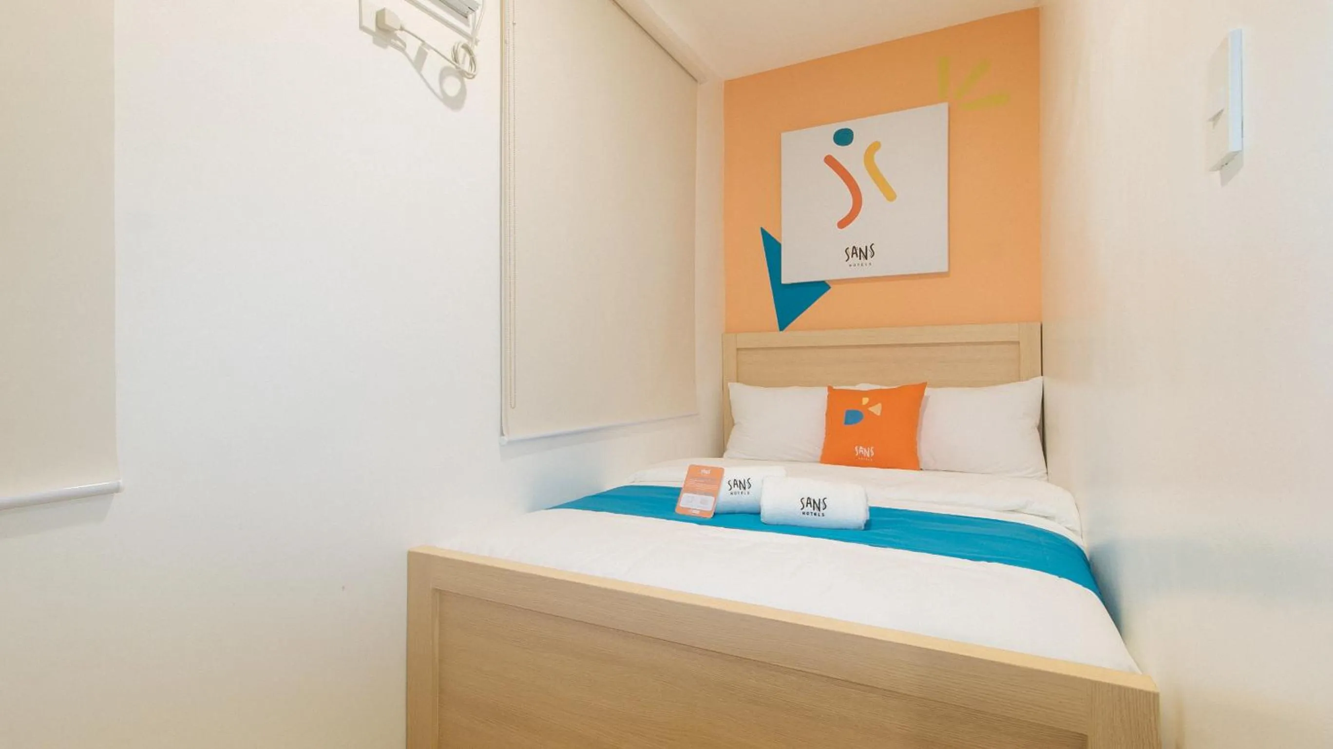 Bed in Sans Hotel at One JD Place Makati by RedDoorz