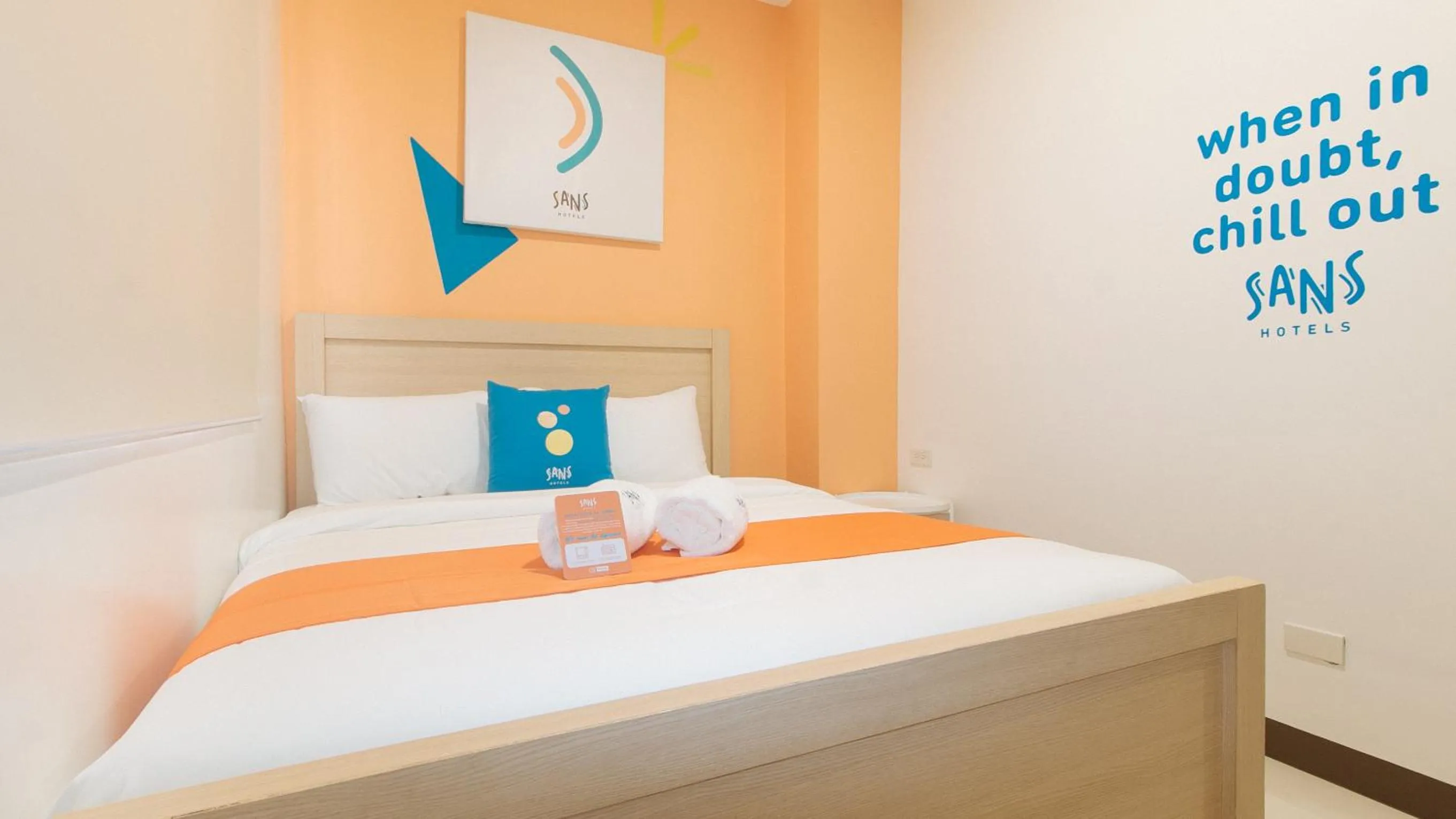 Photo of the whole room, Bed in Sans Hotel at One JD Place Makati by RedDoorz