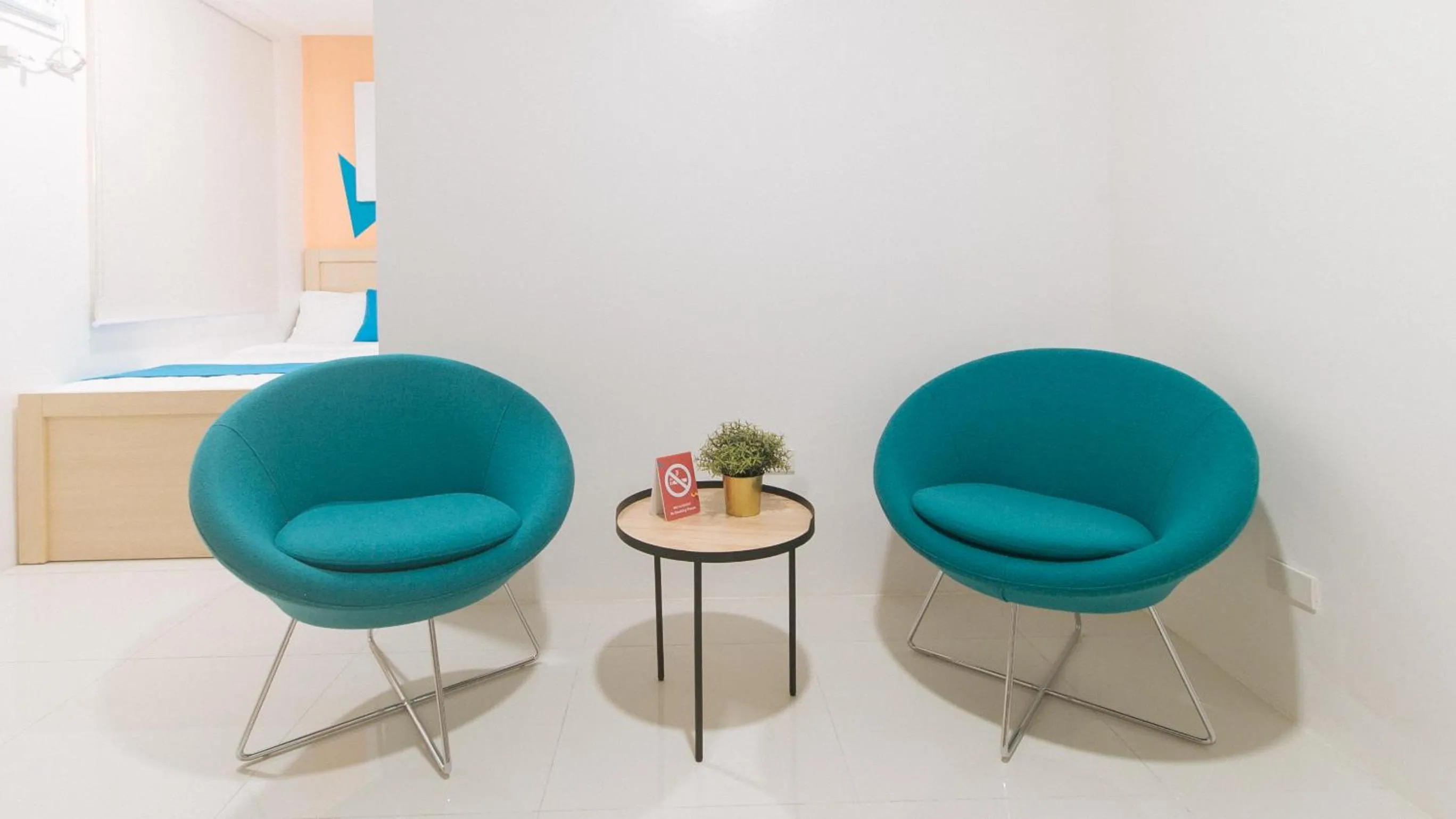 Living room in Sans Hotel at One JD Place Makati by RedDoorz