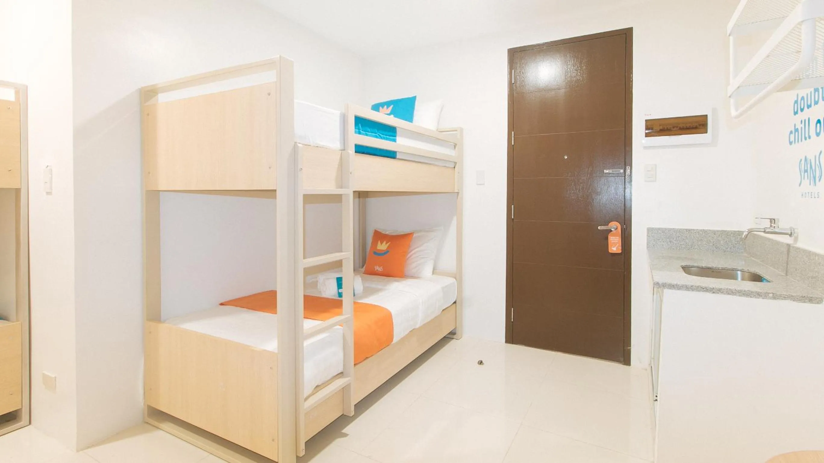 bunk bed, Bed in Sans Hotel at One JD Place Makati by RedDoorz