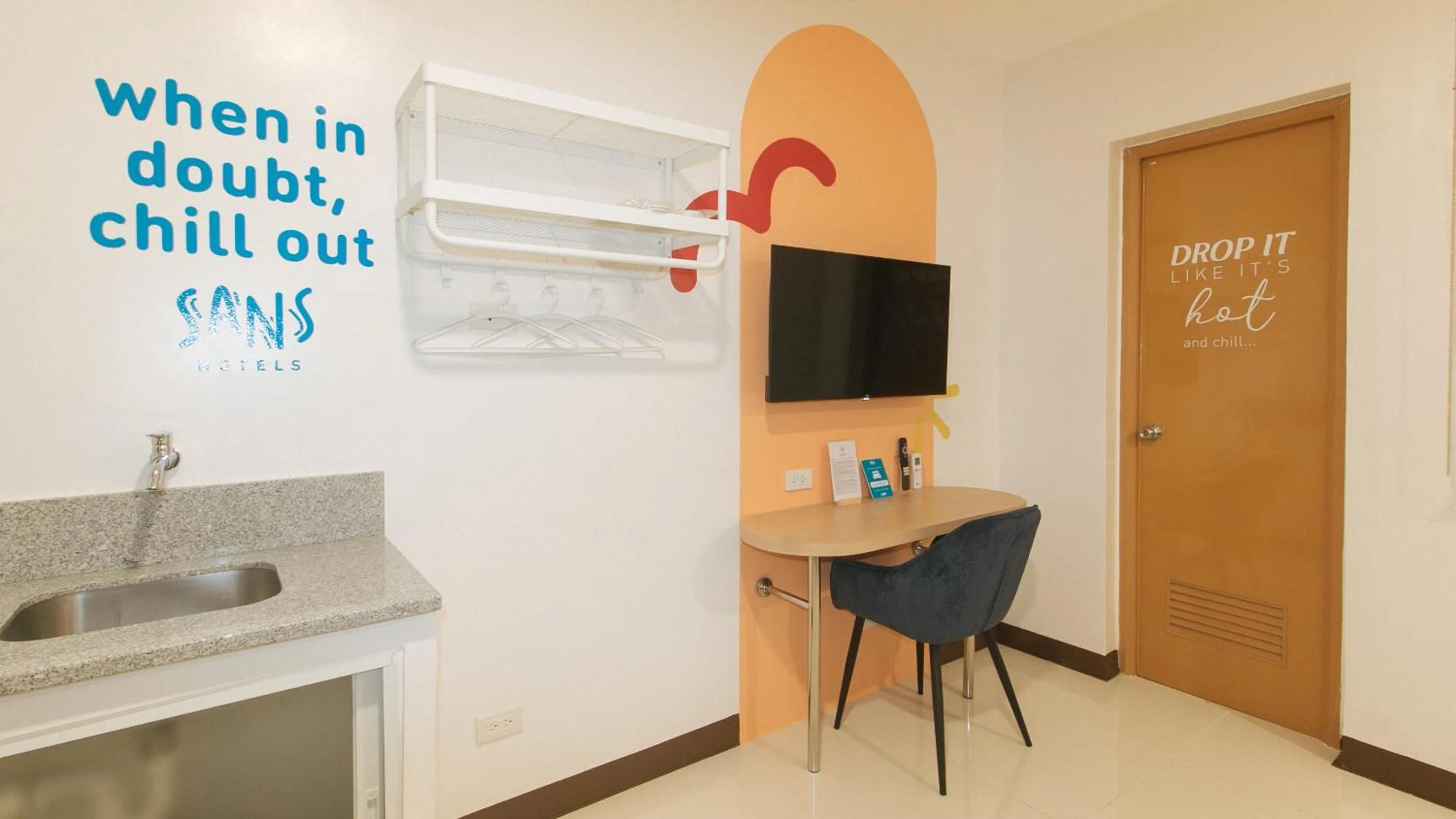 TV and multimedia in Sans Hotel at One JD Place Makati by RedDoorz