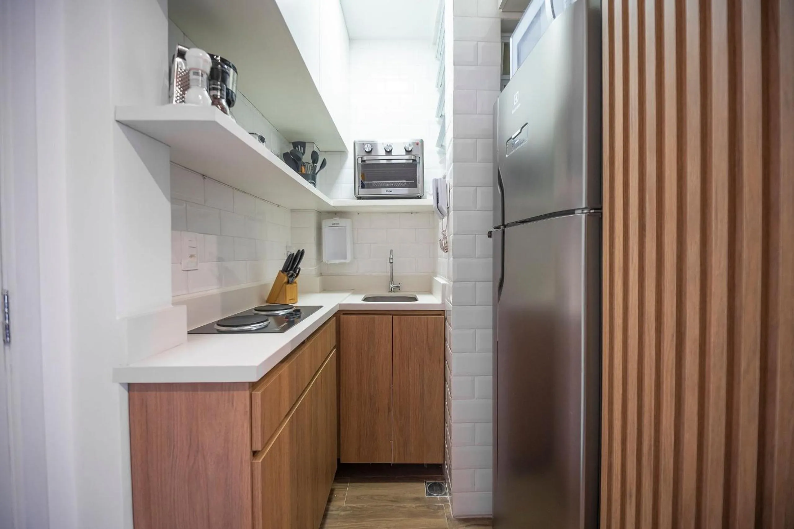 Kitchen or kitchenette in Conforto e praticidade na Gávea