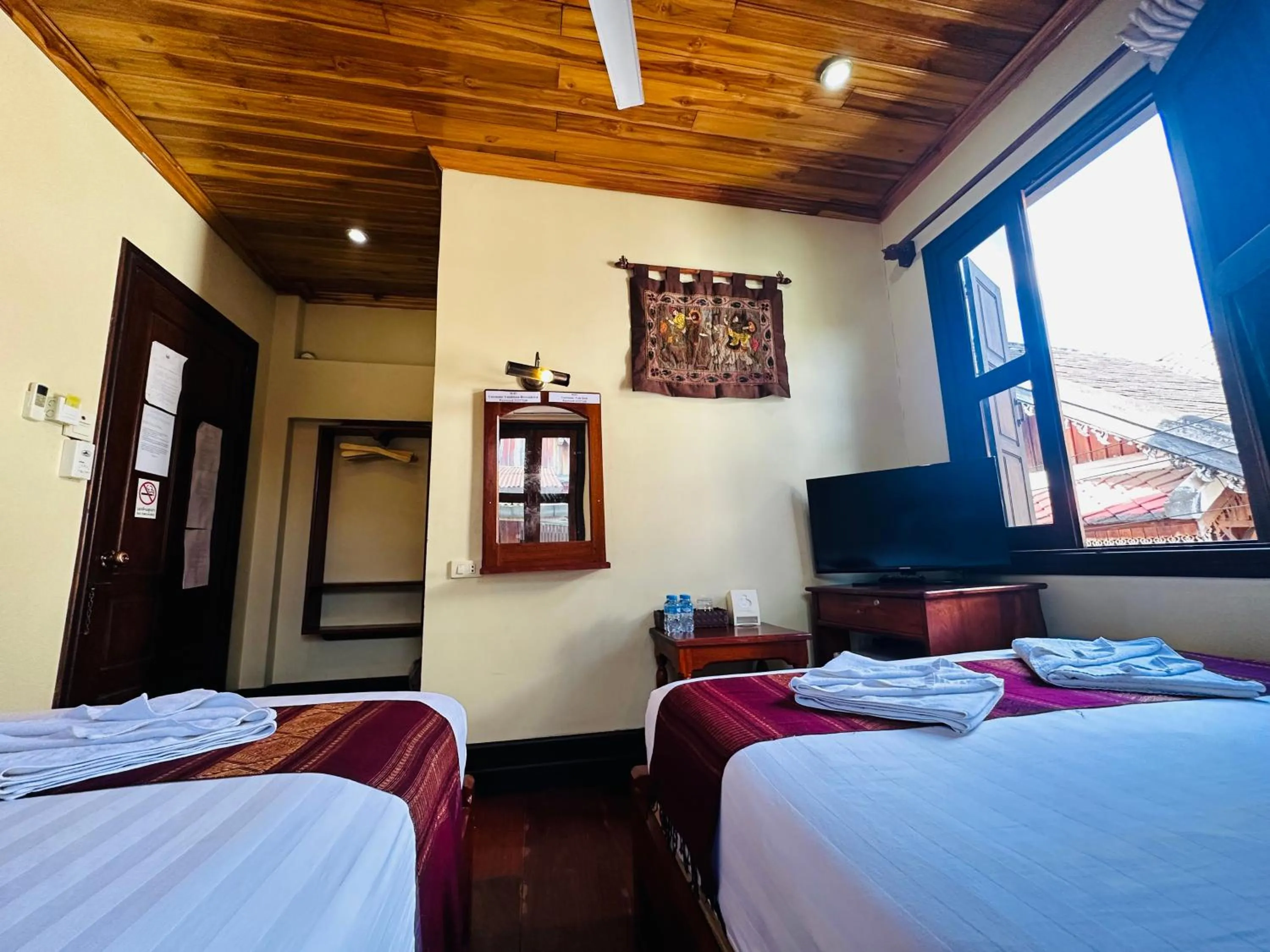 Communal lounge/ TV room, Bed in Anisa Mekong Riverside Villa