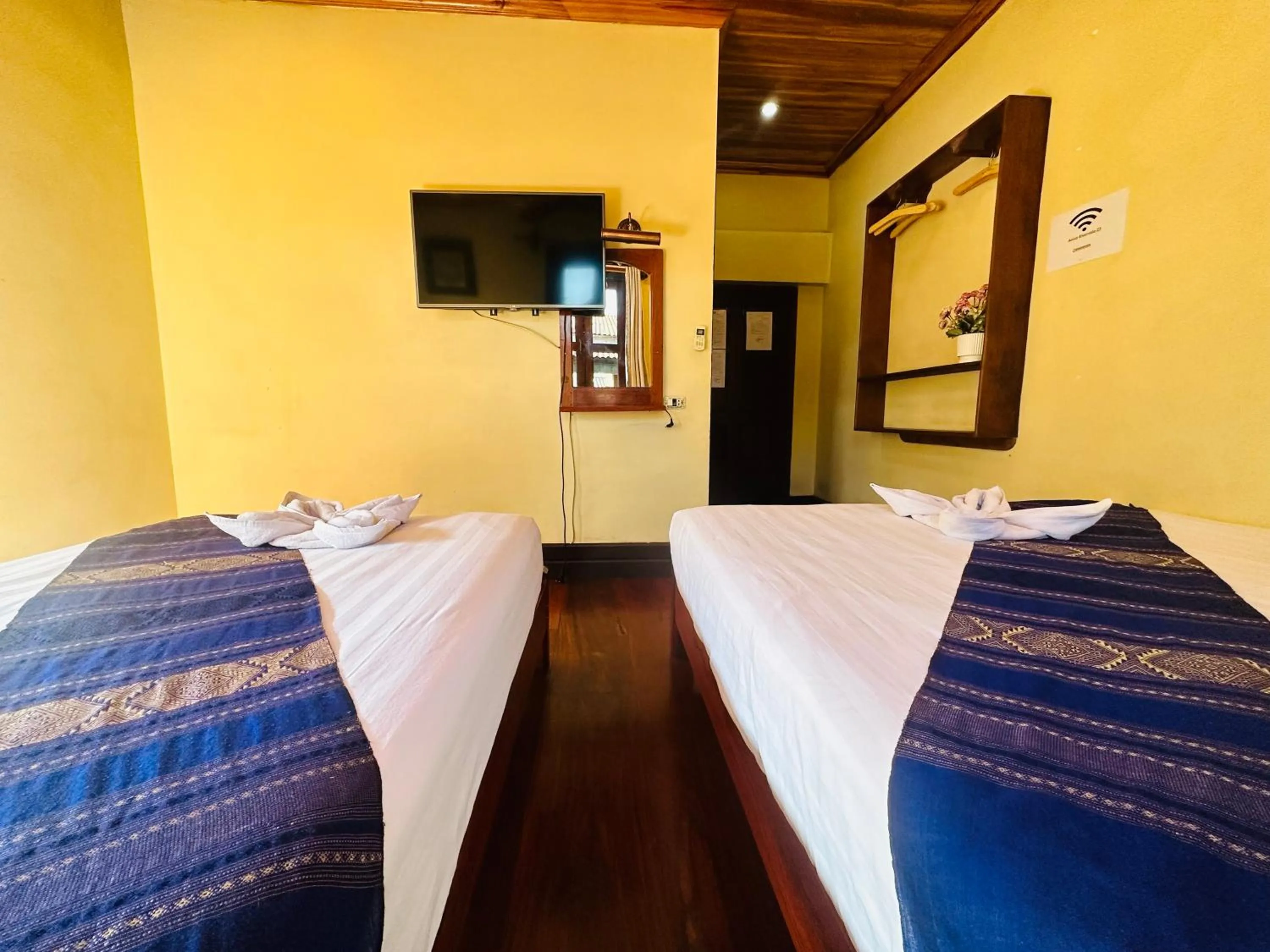 Bed in Anisa Mekong Riverside Villa