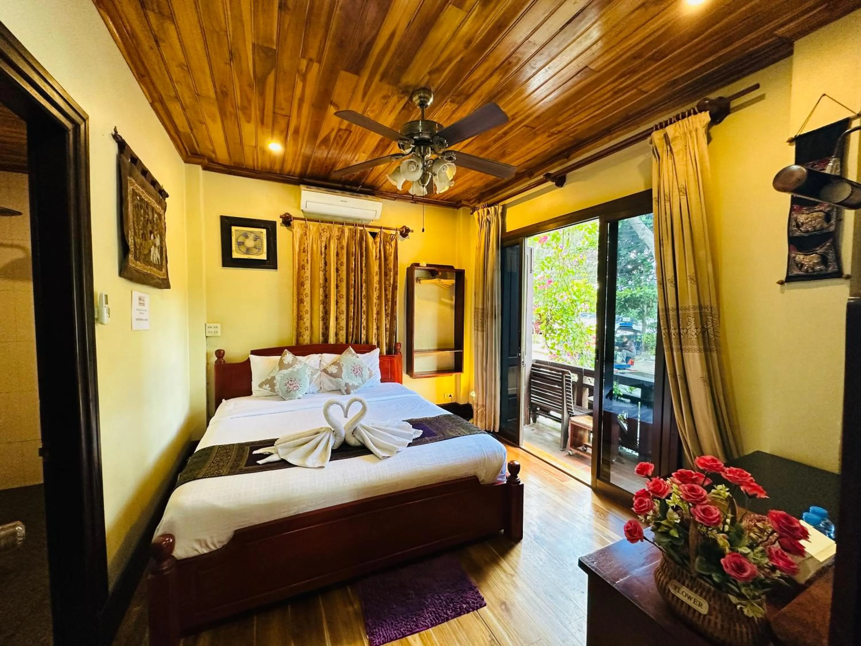 Bed in Anisa Mekong Riverside Villa