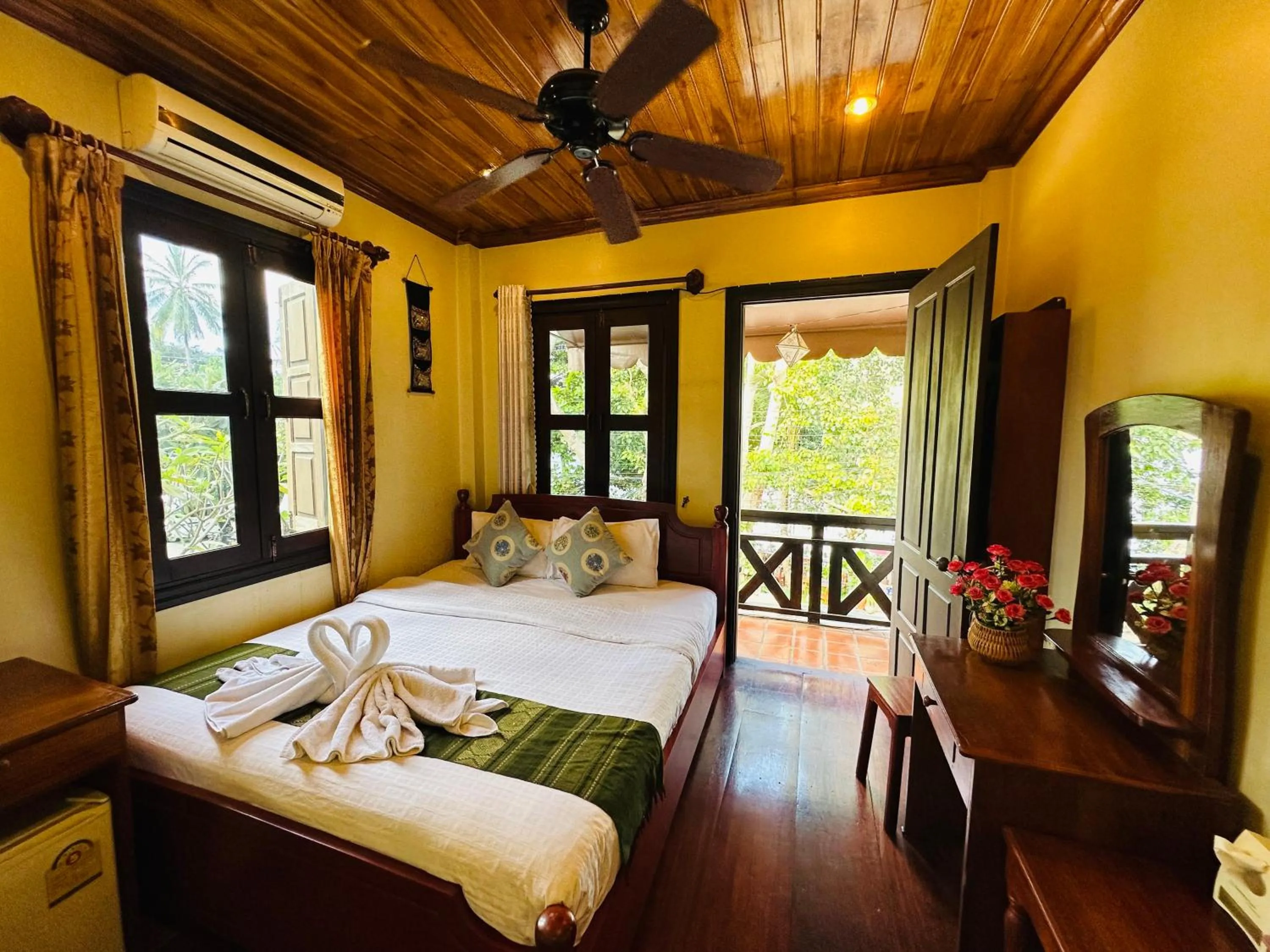 Bed in Anisa Mekong Riverside Villa