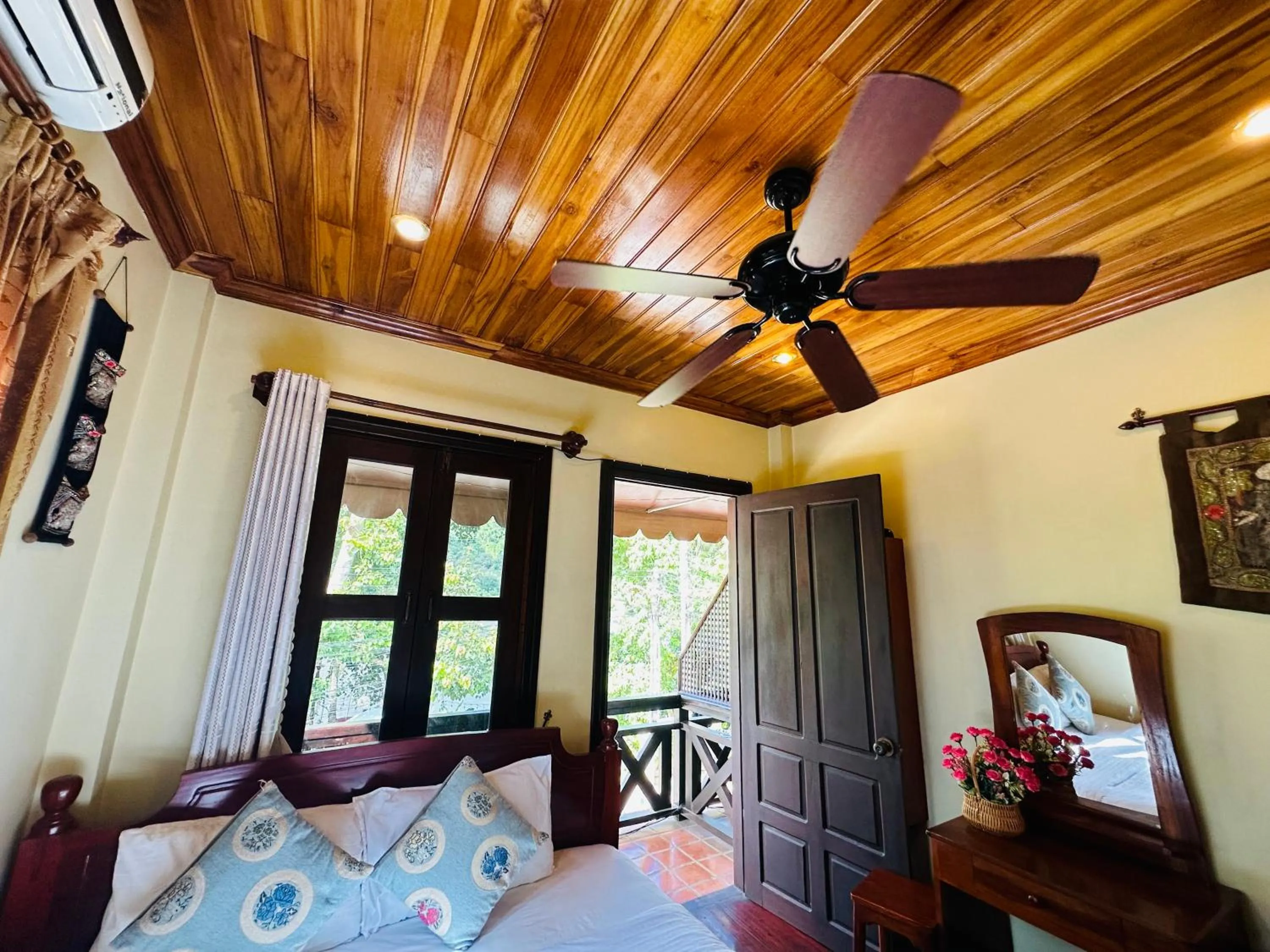 Bed in Anisa Mekong Riverside Villa