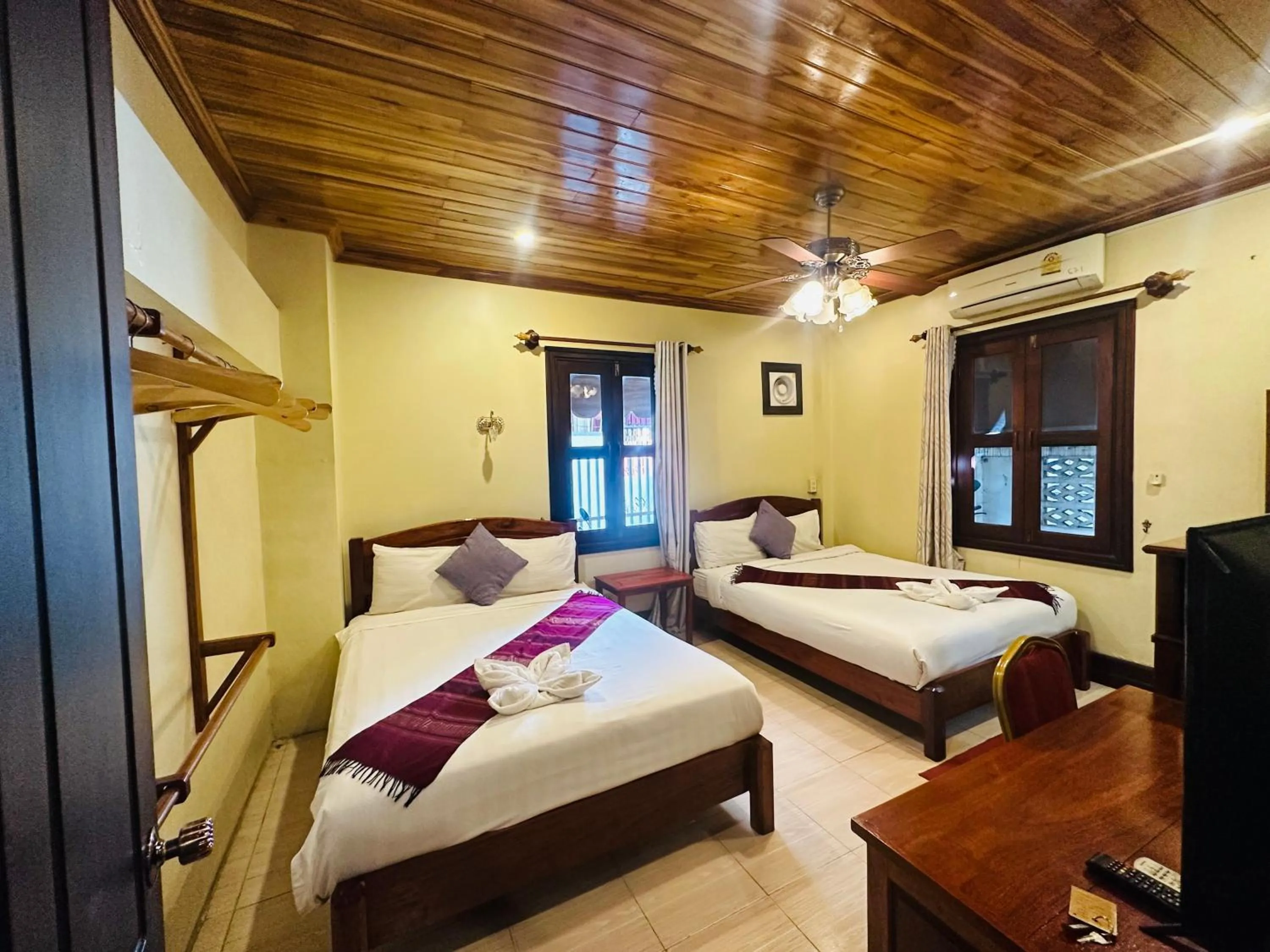 Bed in Anisa Mekong Riverside Villa