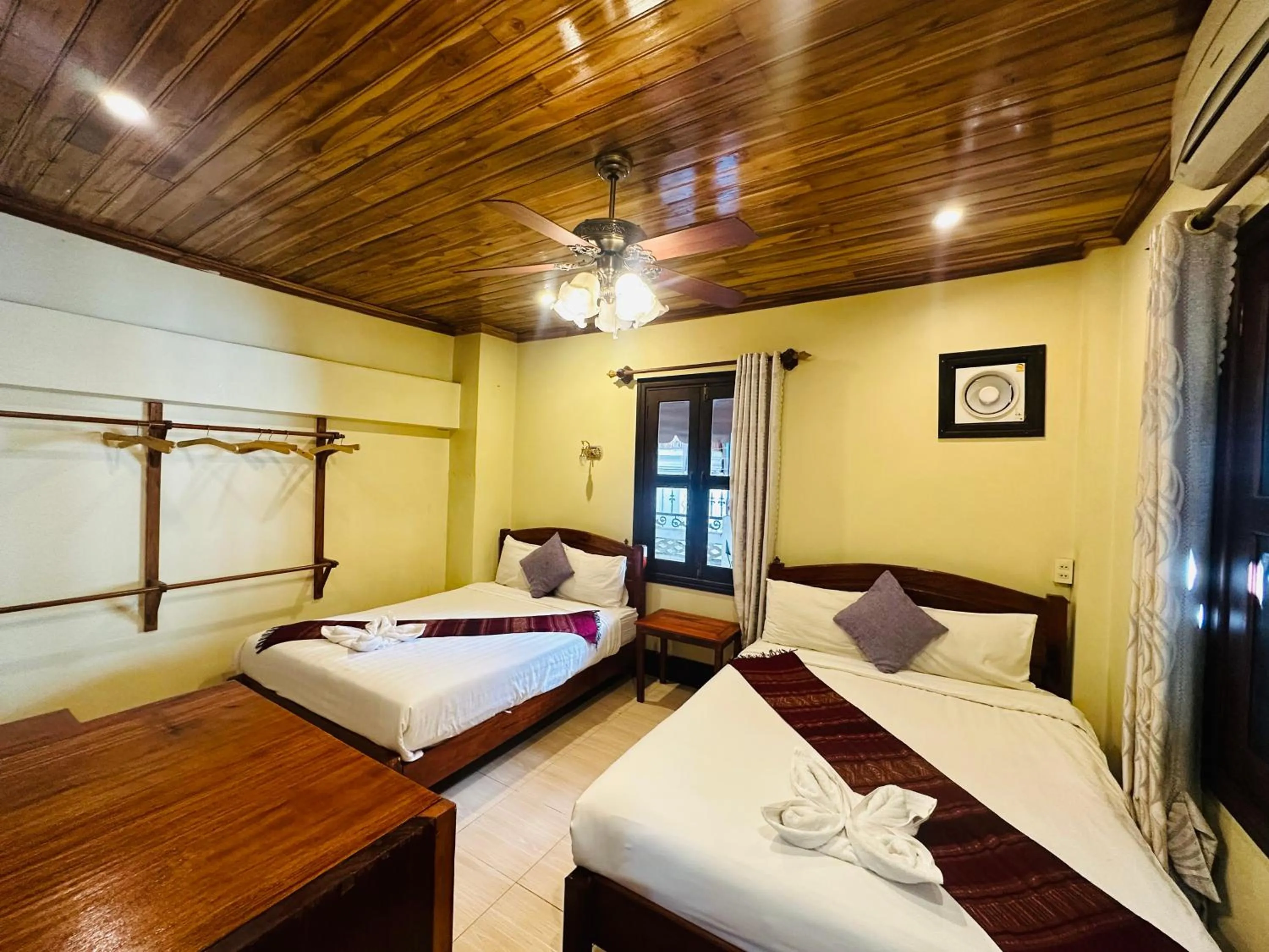 Bed in Anisa Mekong Riverside Villa