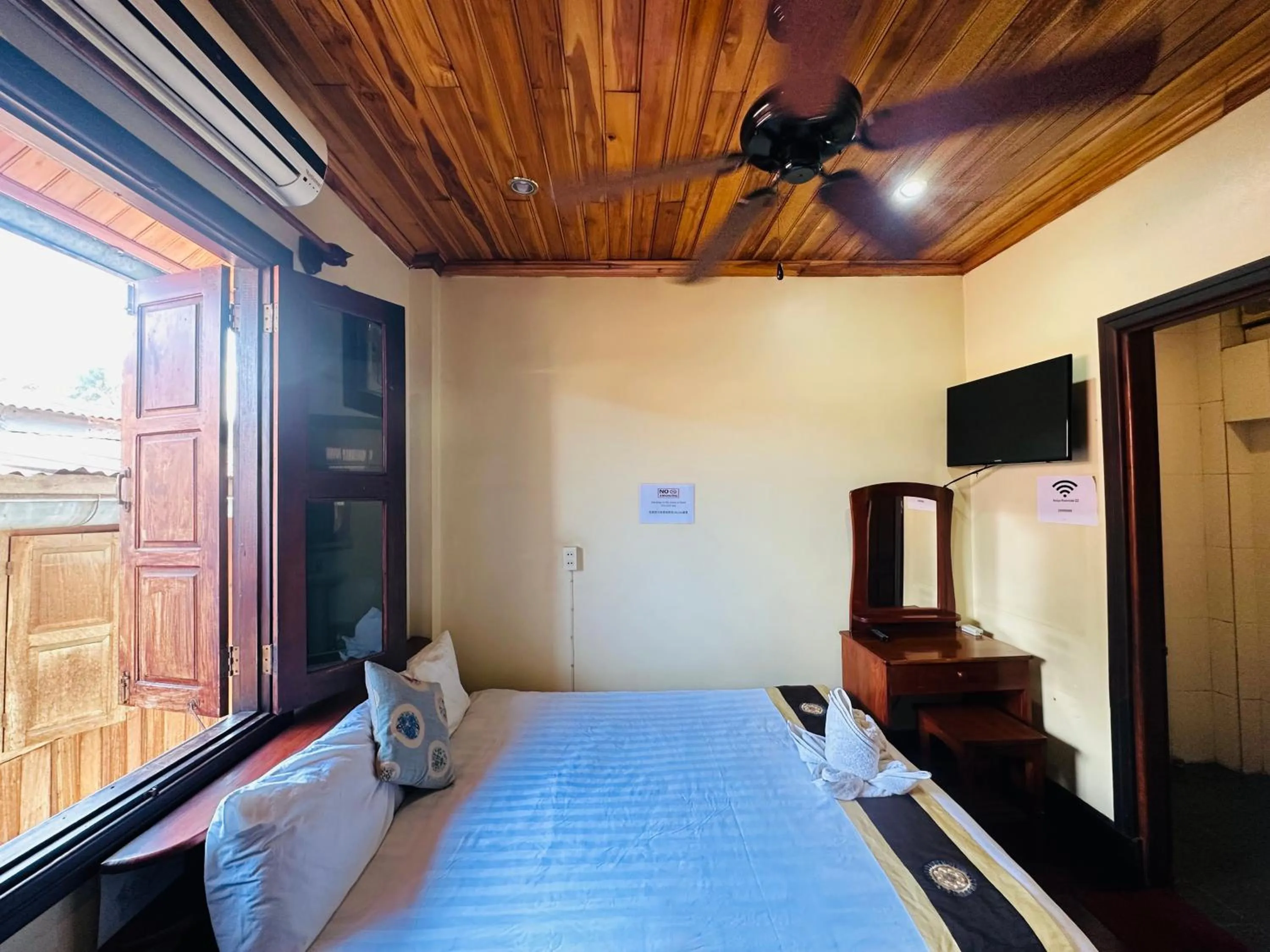 Bed in Anisa Mekong Riverside Villa