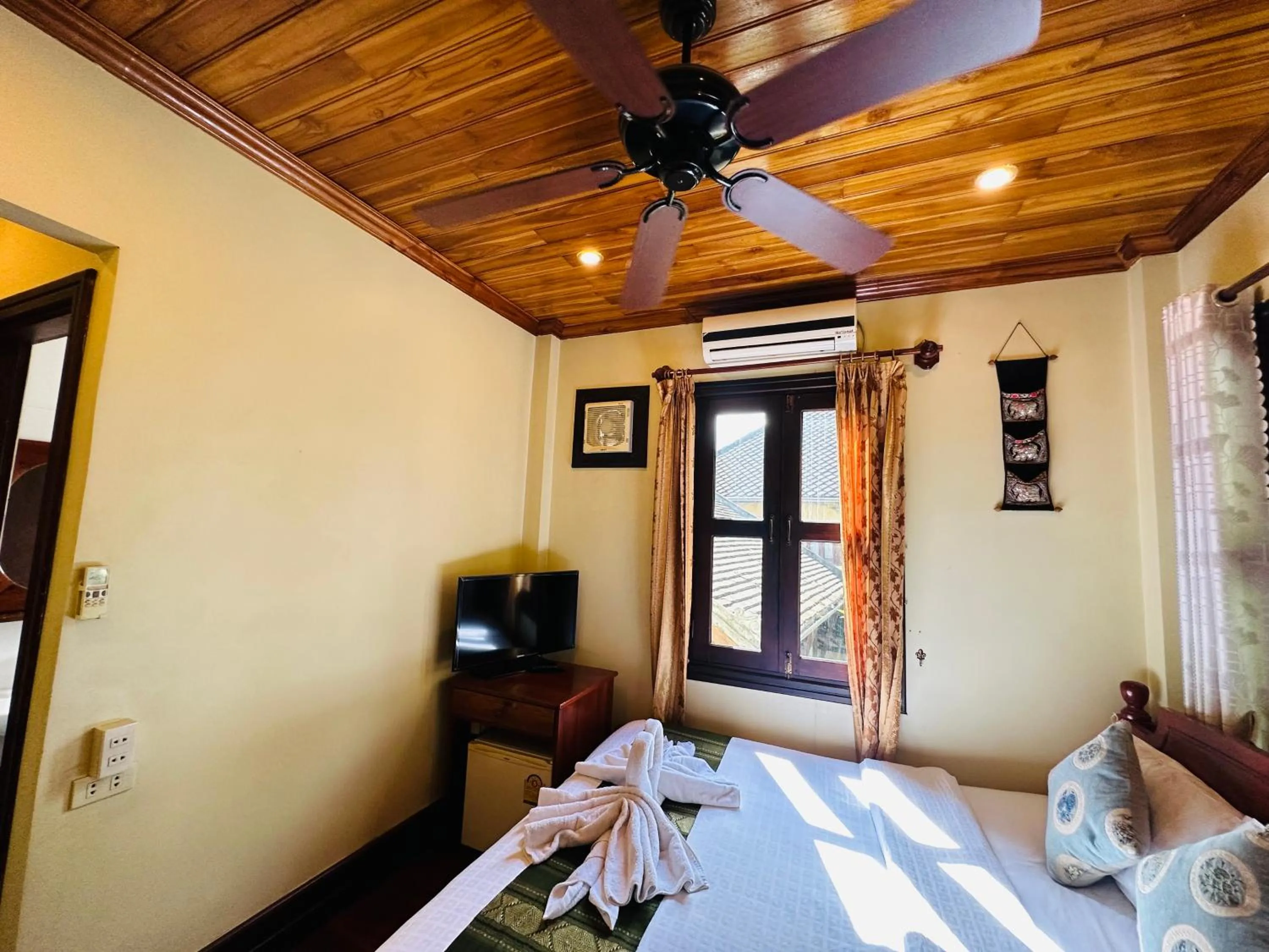 Bed in Anisa Mekong Riverside Villa