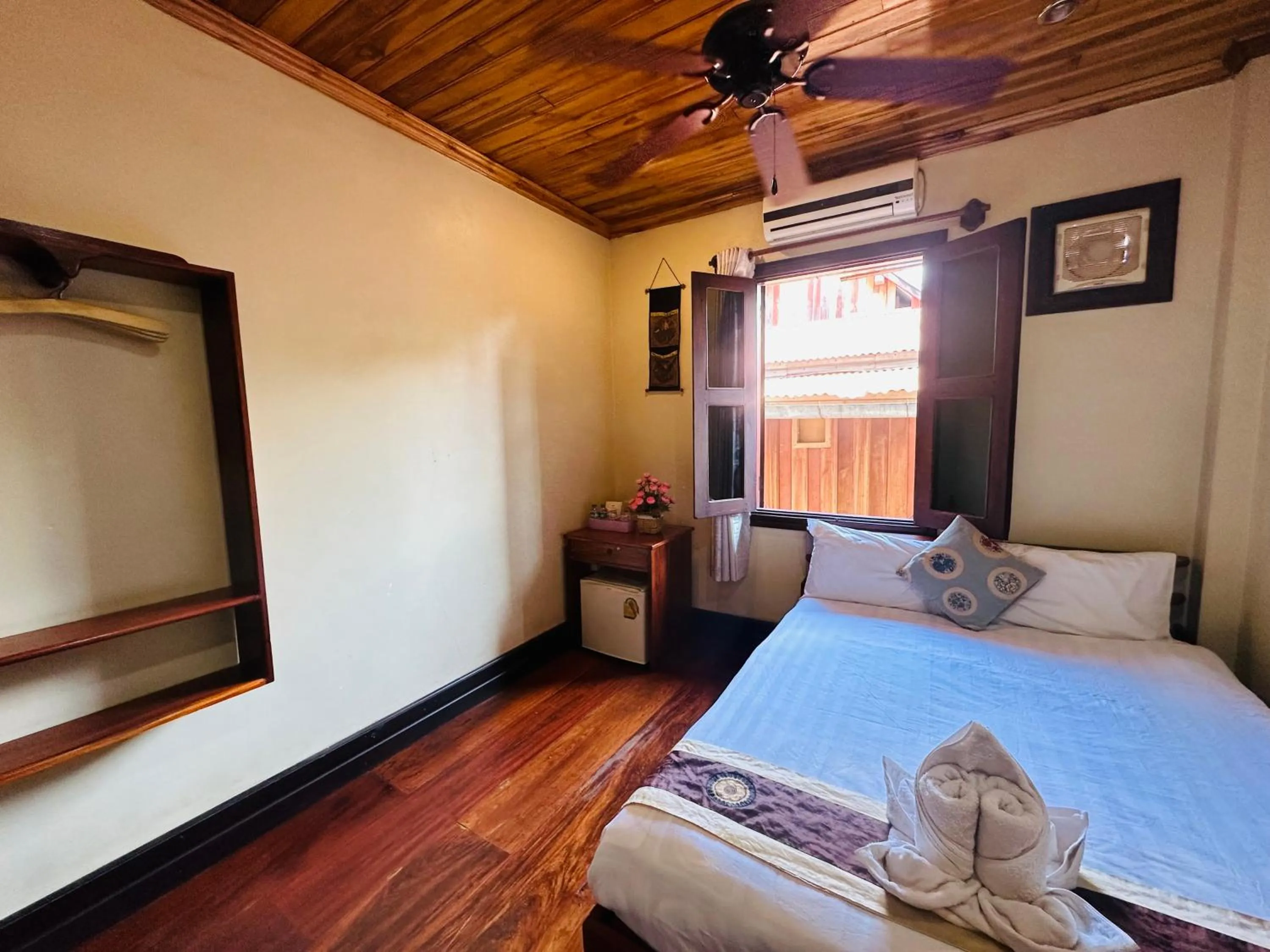 Bed in Anisa Mekong Riverside Villa