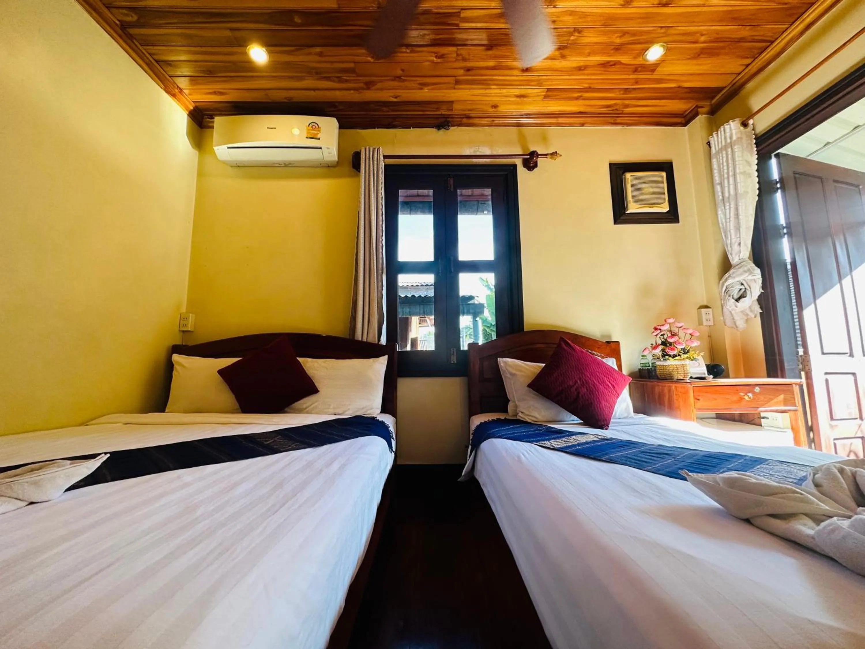 Bed in Anisa Mekong Riverside Villa